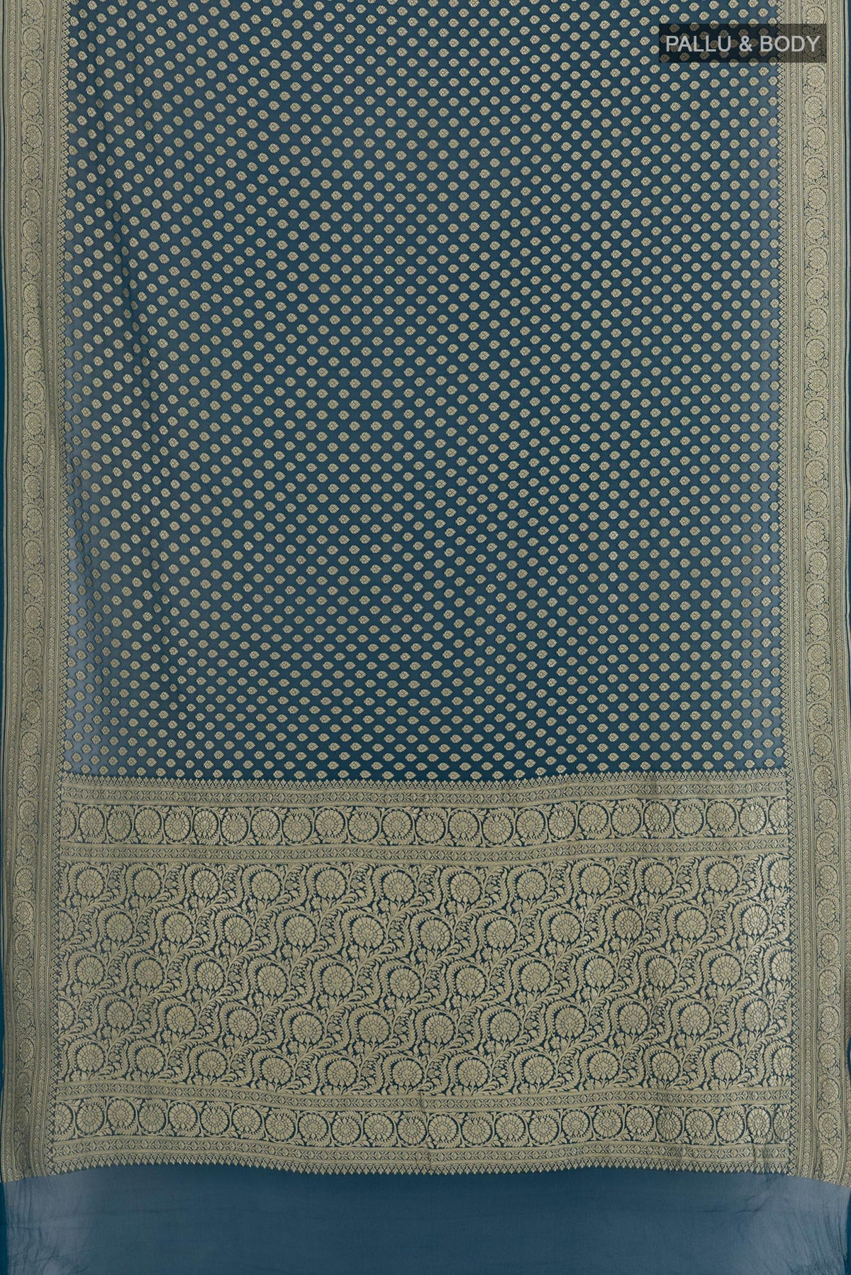 Flat view of Dark Blue Banarasi Georgette Saree with Zari Butta on the body and Zari Border. 