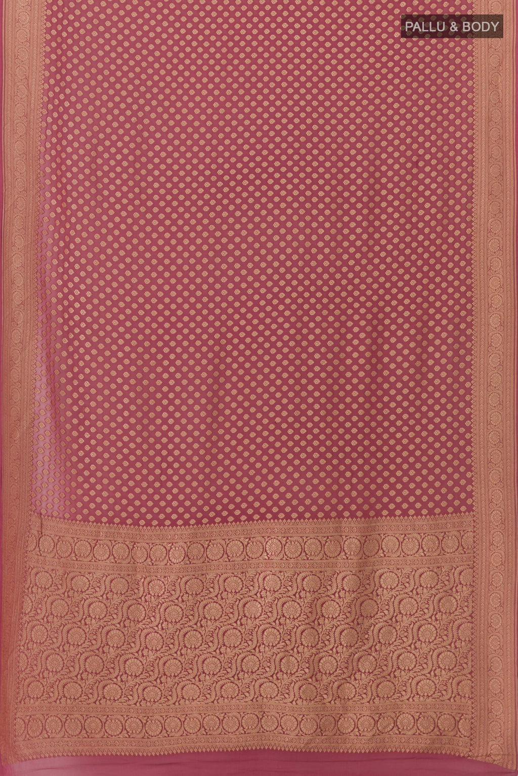 Flat view of Mauve Banarasi Georgette Saree with Zari Butta on the body and Zari Border. 