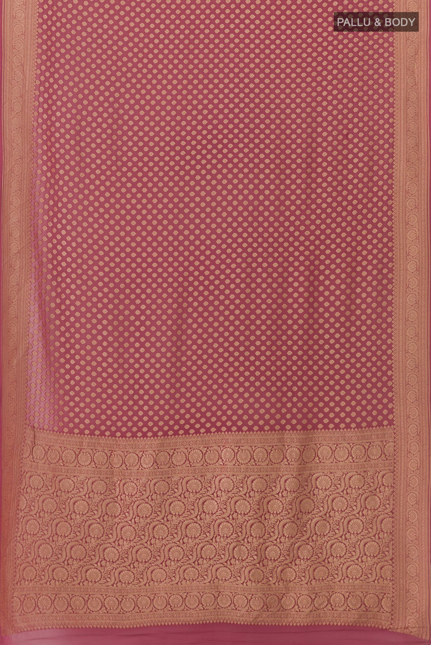 Flat view of Mauve Banarasi Georgette Saree with Zari Butta on the body and Zari Border. 