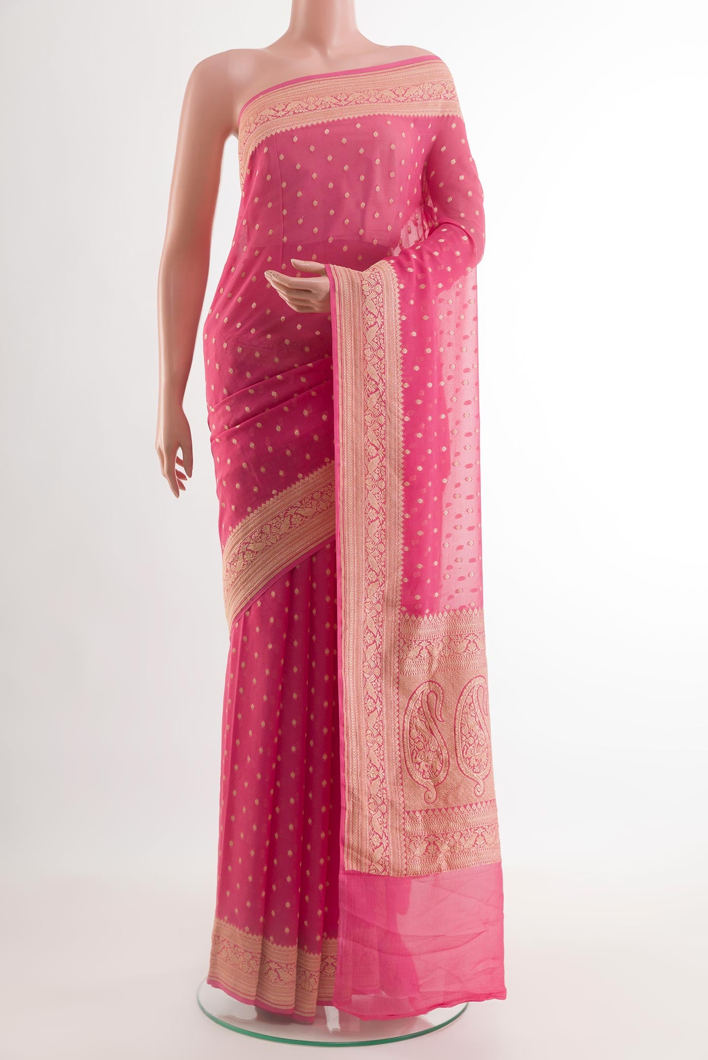 Pink Banarasi Georgette Saree with Zari Butta on the body and Zari Border.  displayed on a mannequin