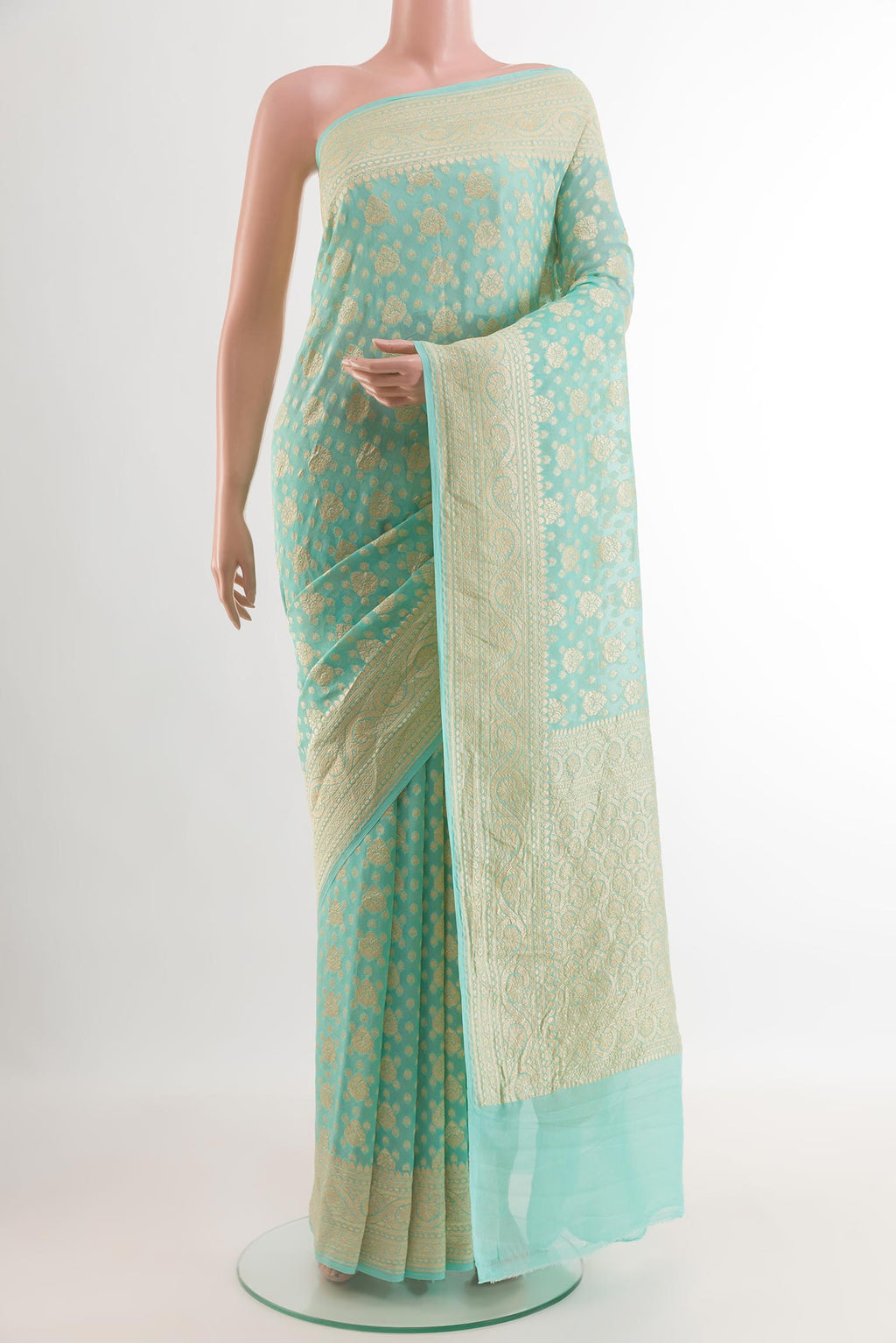 Light Blue Banarasi Georgette Saree with Zari Brocade on the body and Zari Border.  displayed on a mannequin