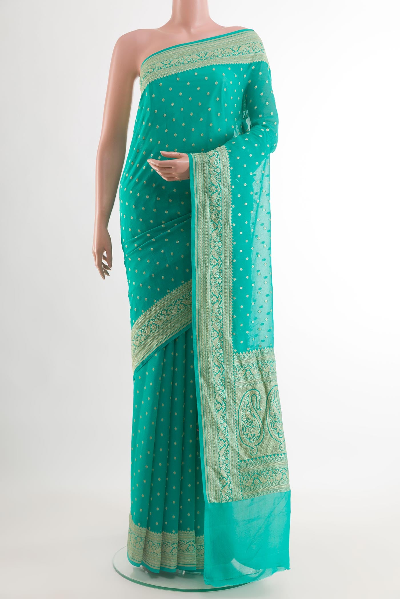 Blue Banarasi Georgette Saree with Zari Butta on the body and Zari Border.  displayed on a mannequin
