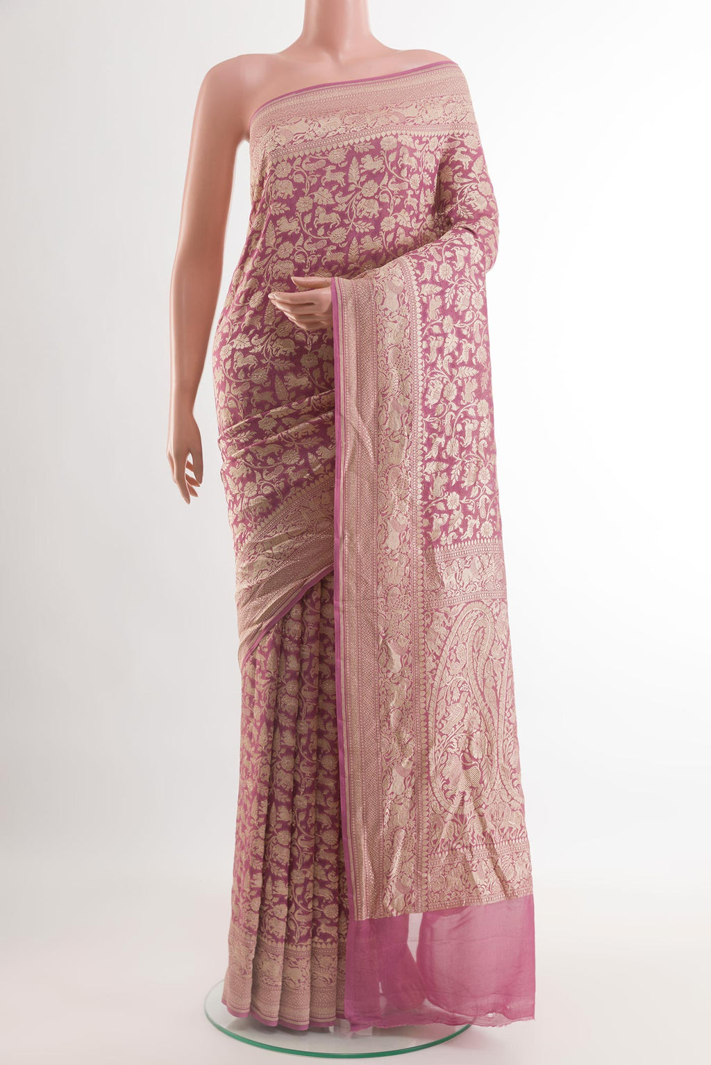 Pink Banarasi Georgette Saree with Zari Brocade on the body and Zari Border.  displayed on a mannequin
