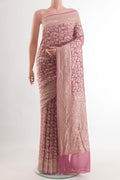Pink Banarasi Georgette Saree with Zari Brocade on the body and Zari Border.  displayed on a mannequin