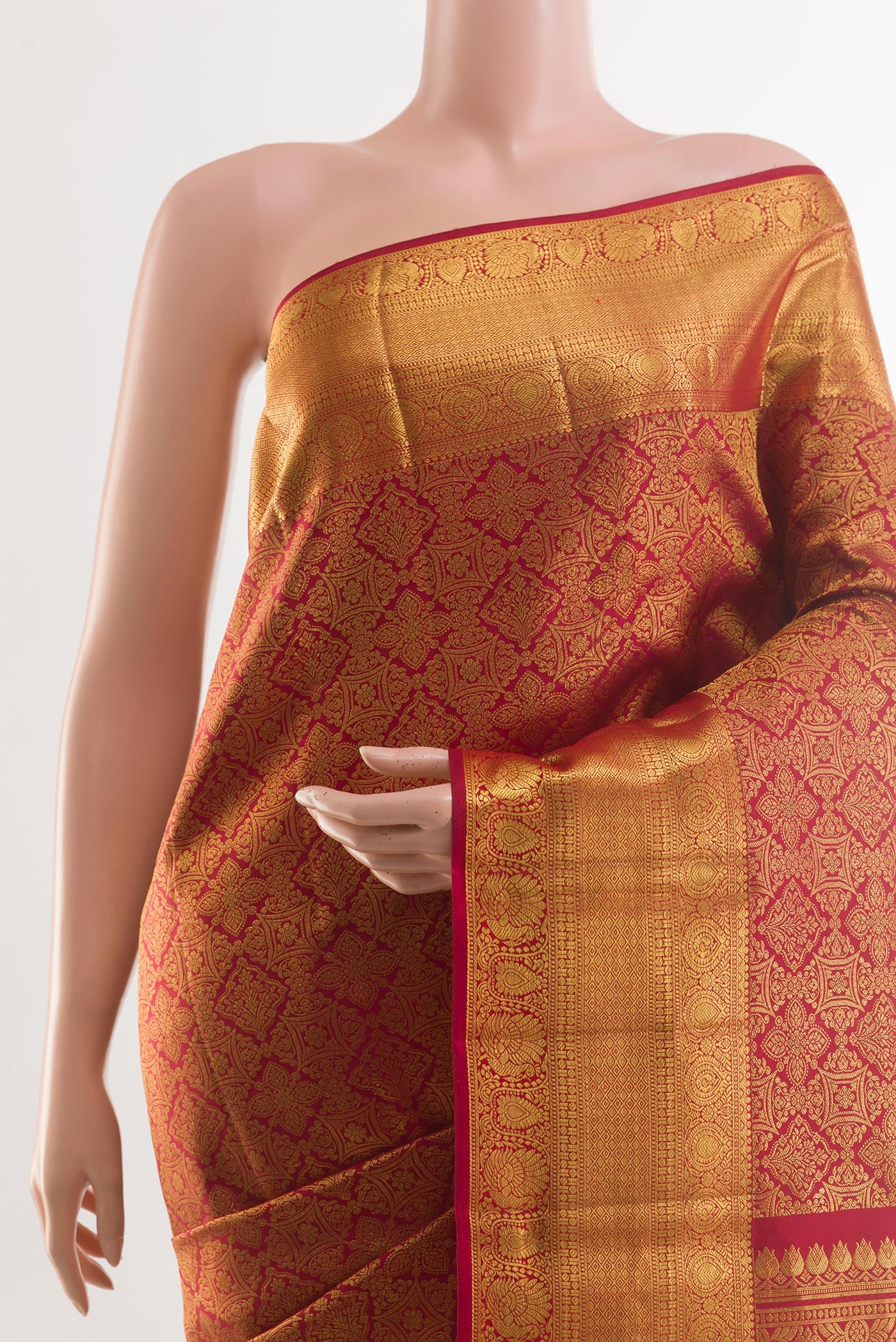 Border image of Maroon Kanchipuram Silk Saree with Zari Brocade on the body and Zari Border. 
