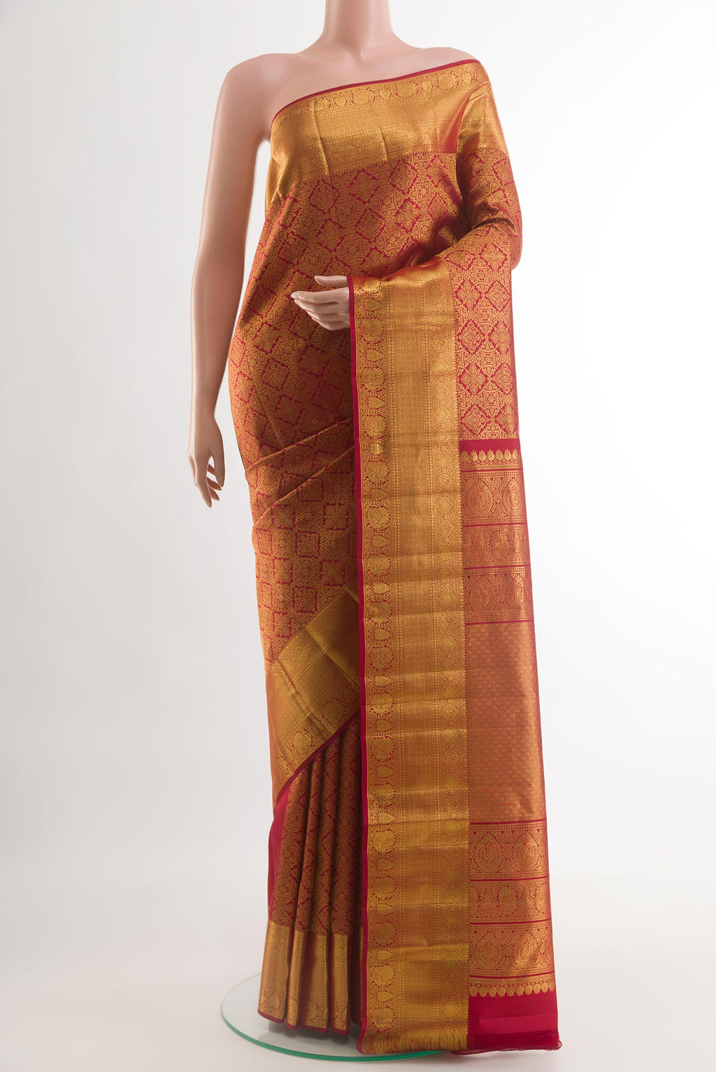 Maroon Kanchipuram Silk Saree with Zari Brocade on the body and Zari Border.  displayed on a mannequin