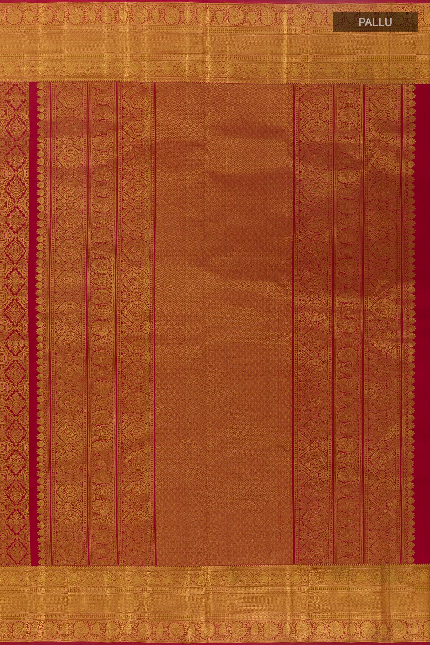 Close up image of the pallu of Maroon Kanchipuram Silk Saree with Zari Brocade on the body and Zari Border. 
