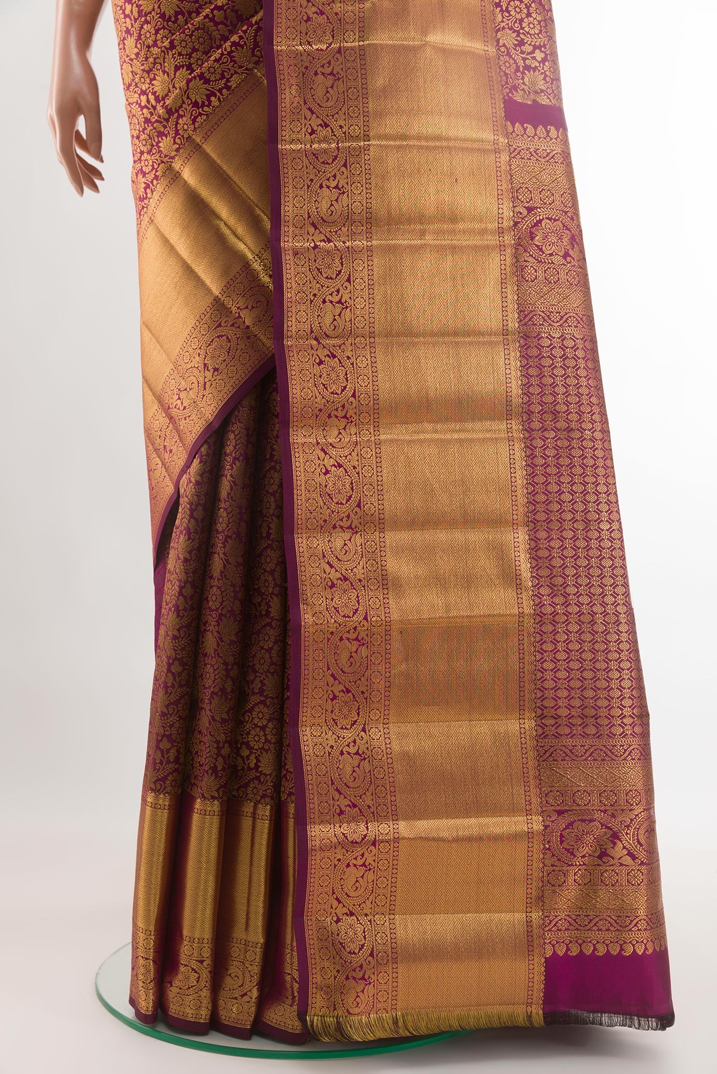 Pleats and pallu of Purple Kanchipuram Silk Saree with Zari Brocade on the body and Zari Border. 