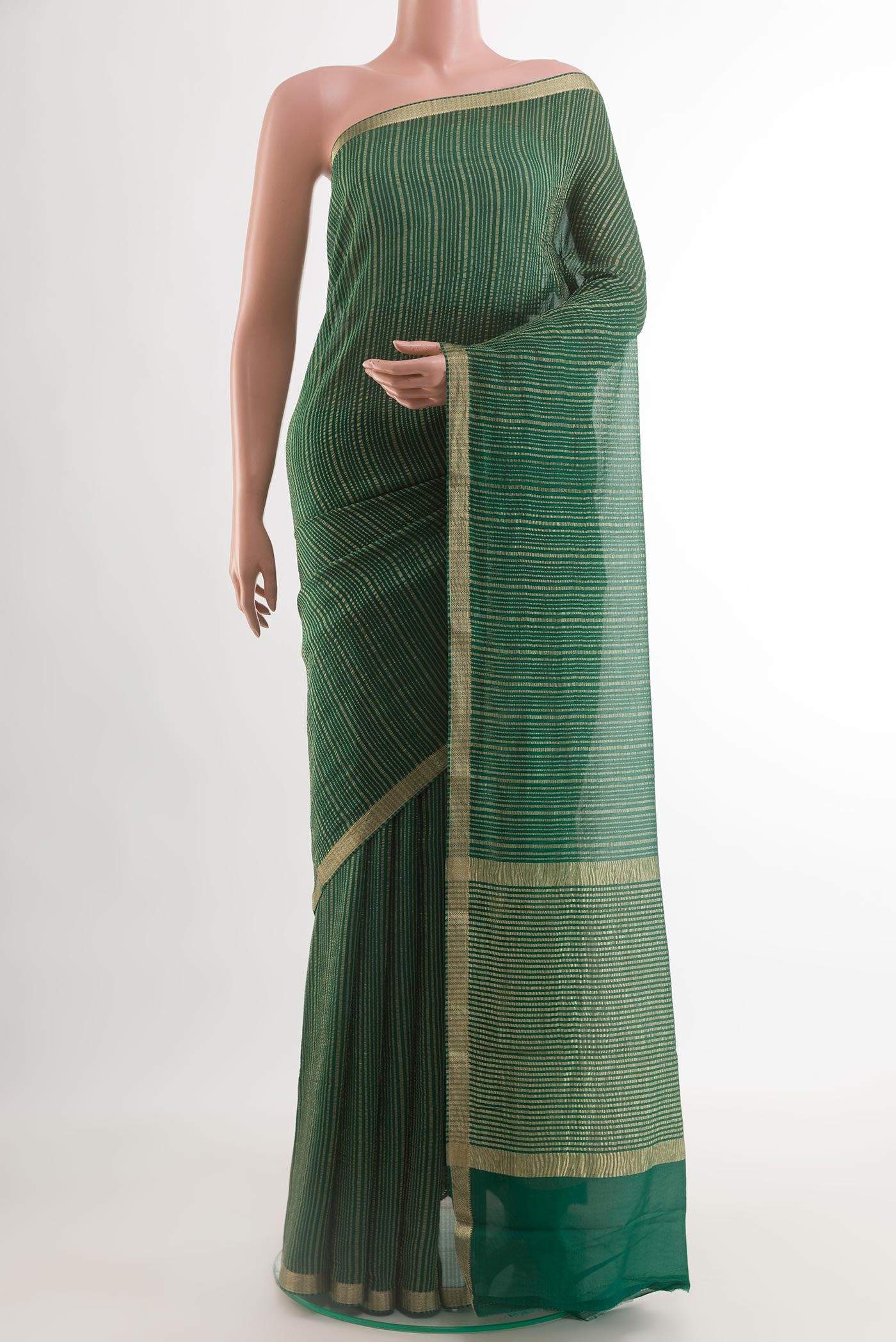 Green Mysore Crepe Saree with Stripes on the body and Zari Border.  displayed on a mannequin