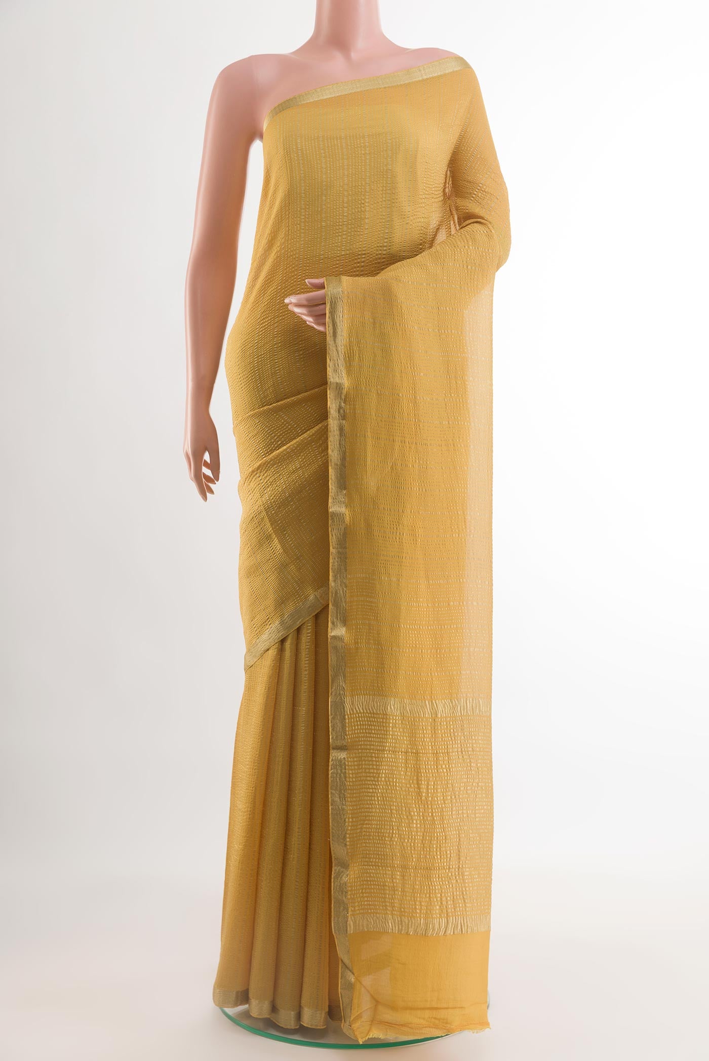 Yellow Mysore Crepe Saree with Stripes on the body and Zari Border.  displayed on a mannequin