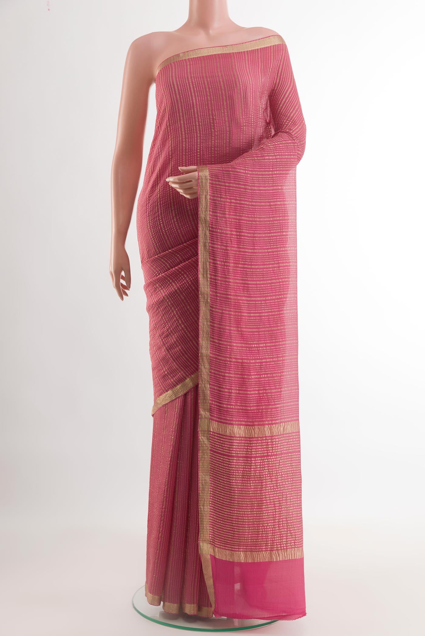 Pink Mysore Crepe Saree with Stripes on the body and Zari Border.  displayed on a mannequin