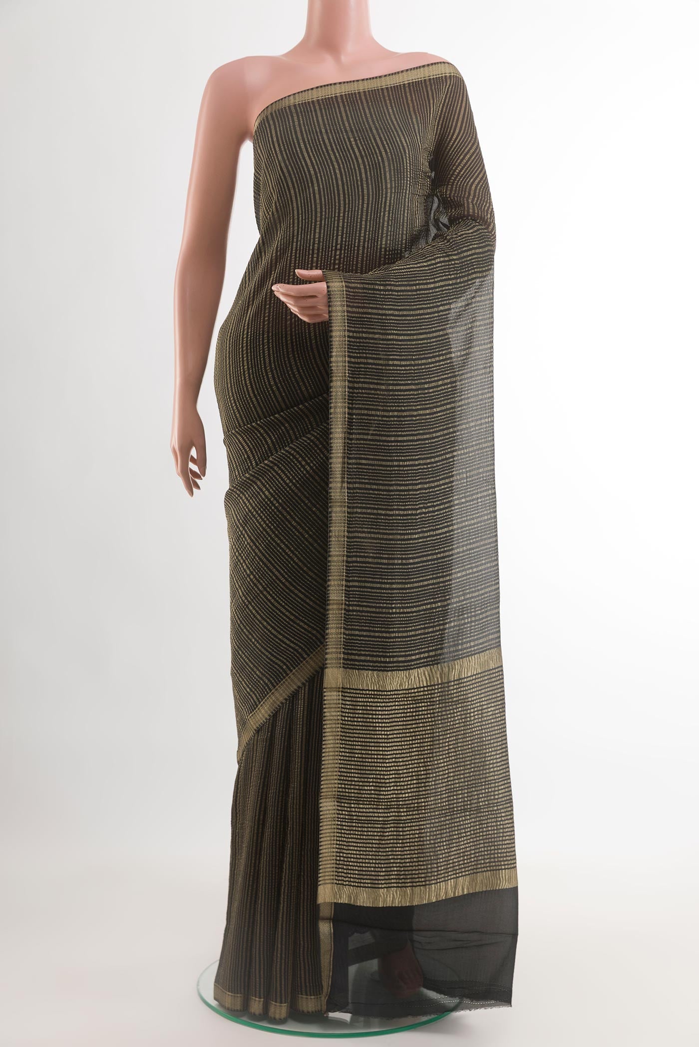 Black Mysore Crepe Saree with Stripes on the body and Zari Border.  displayed on a mannequin