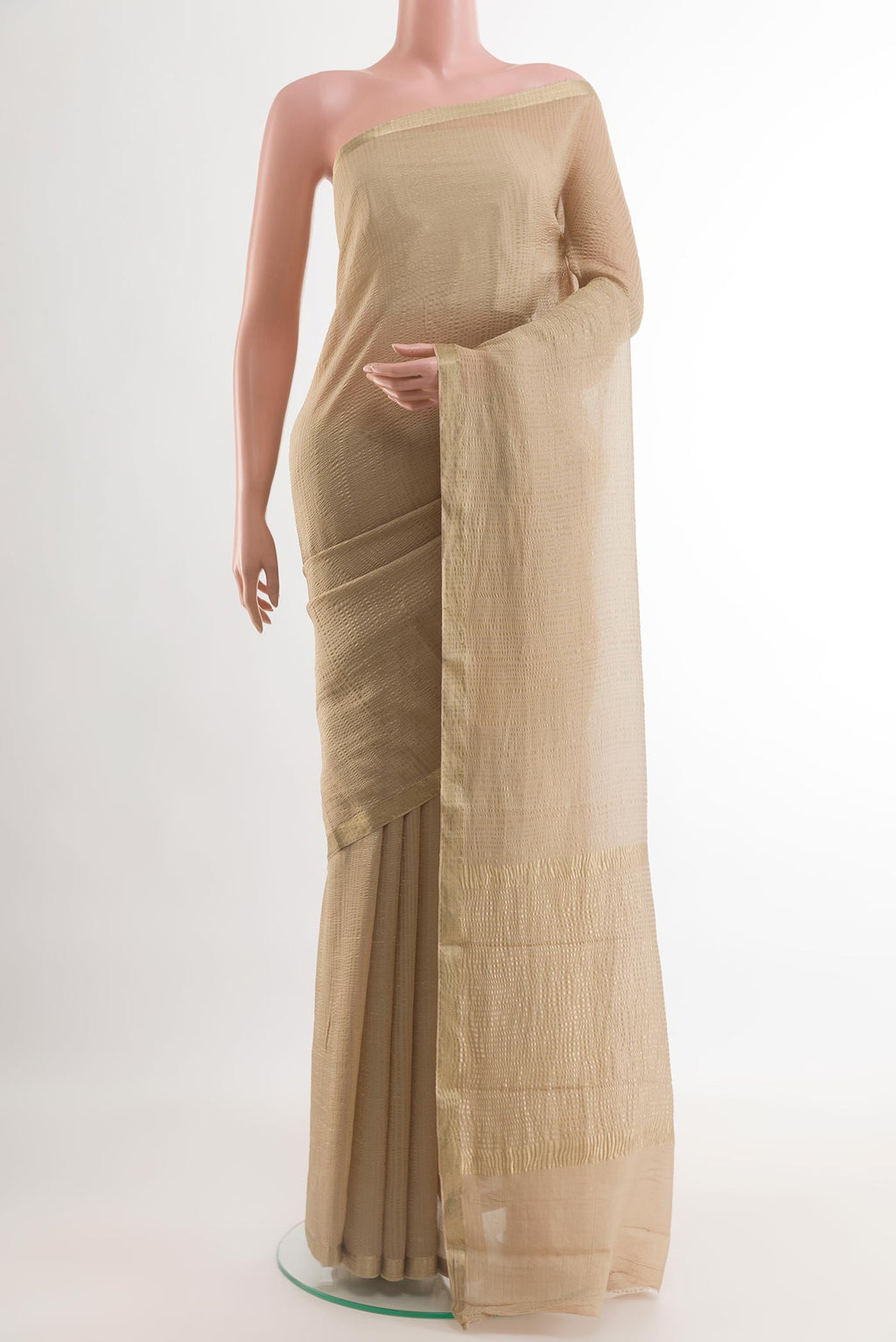 Beige Mysore Crepe Saree with Stripes on the body and Zari Border.  displayed on a mannequin