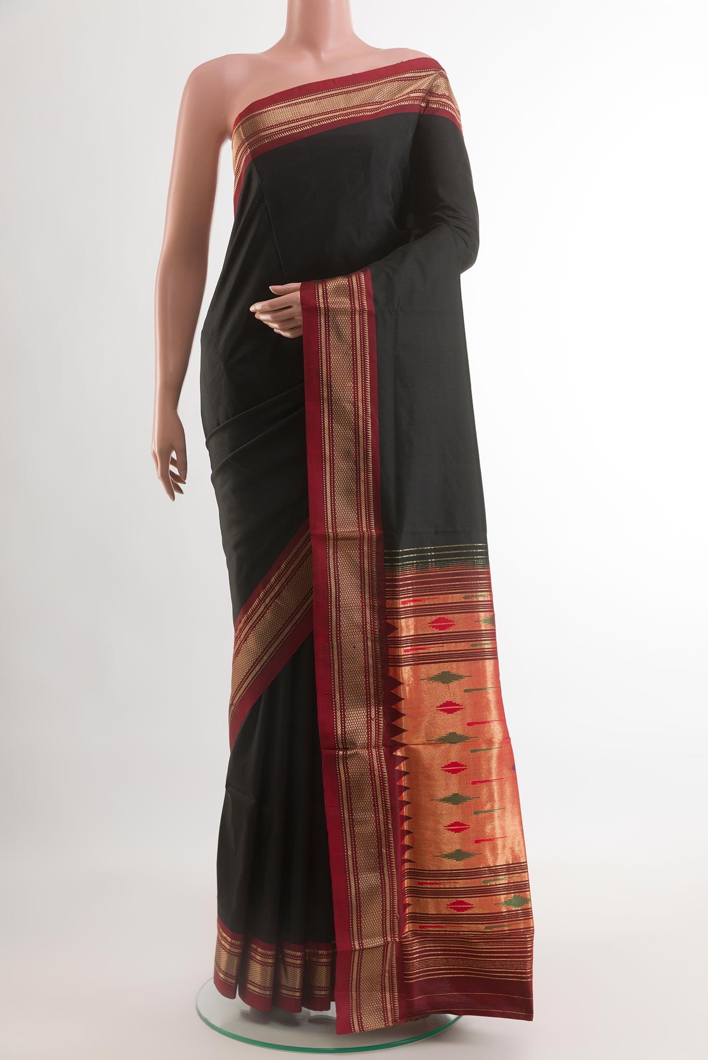 Black Paithani Silk Saree with Zari Butta on the body and Zari Border.  displayed on a mannequin