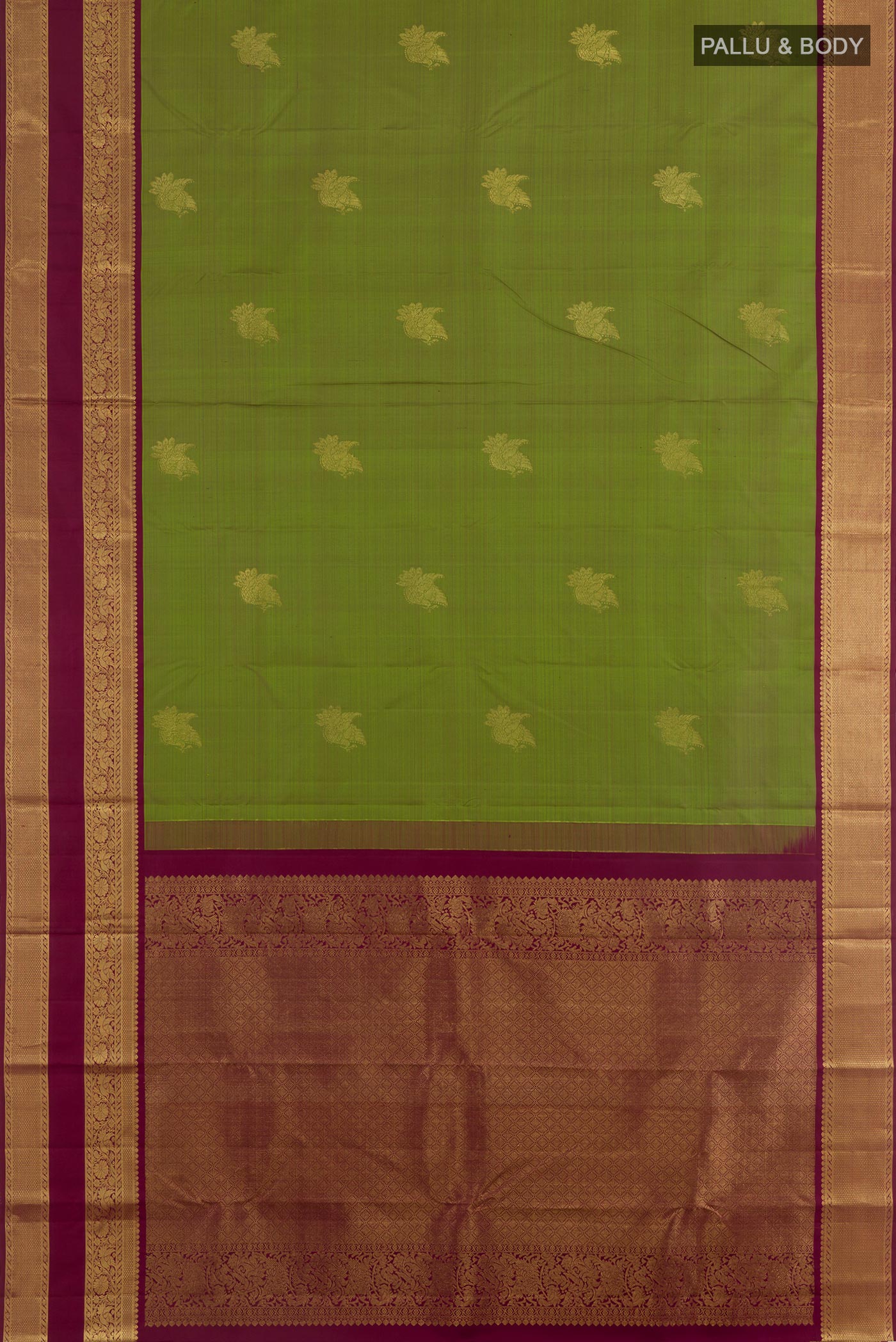Flat view of Green Kanjivaram Silk Saree with Zari Butta on the body and Zari Border. 