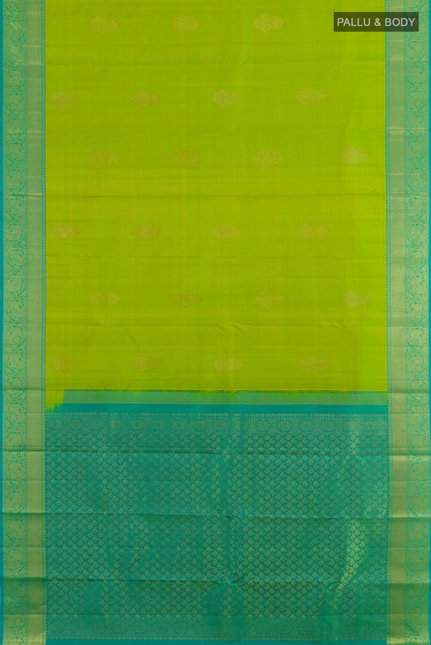 Flat view of Green Kanchipuram Silk Saree with Zari Butta on the body and Zari Border. 