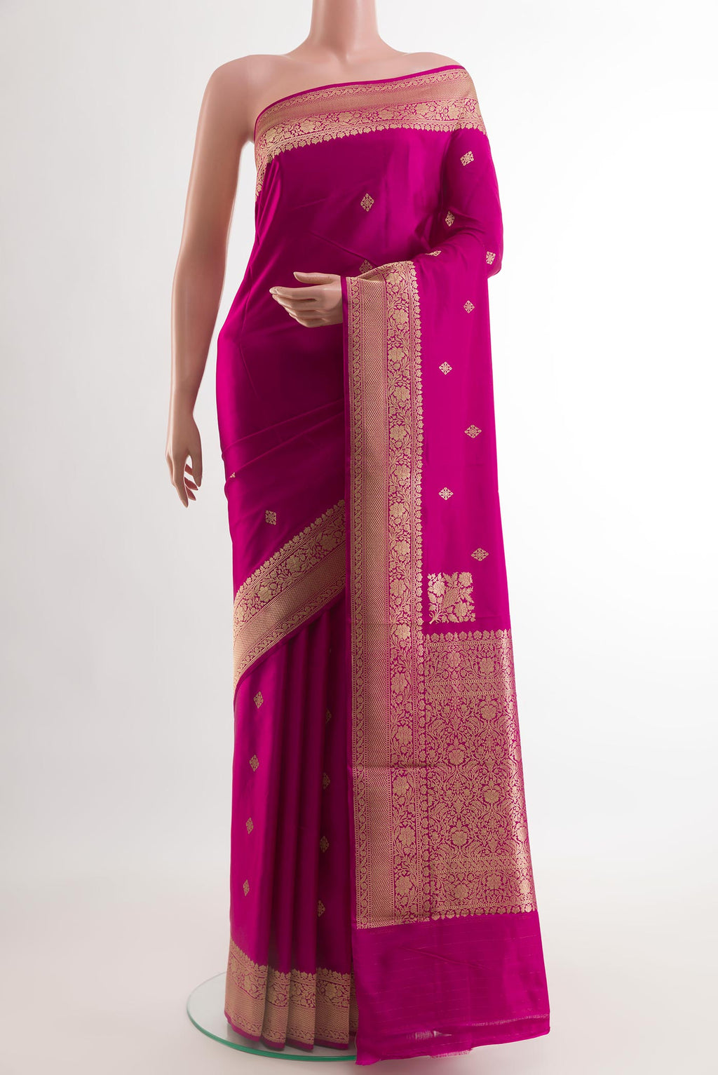 Pink Banarasi Silk Saree with Zari Butta on the body and Zari Border.  displayed on a mannequin
