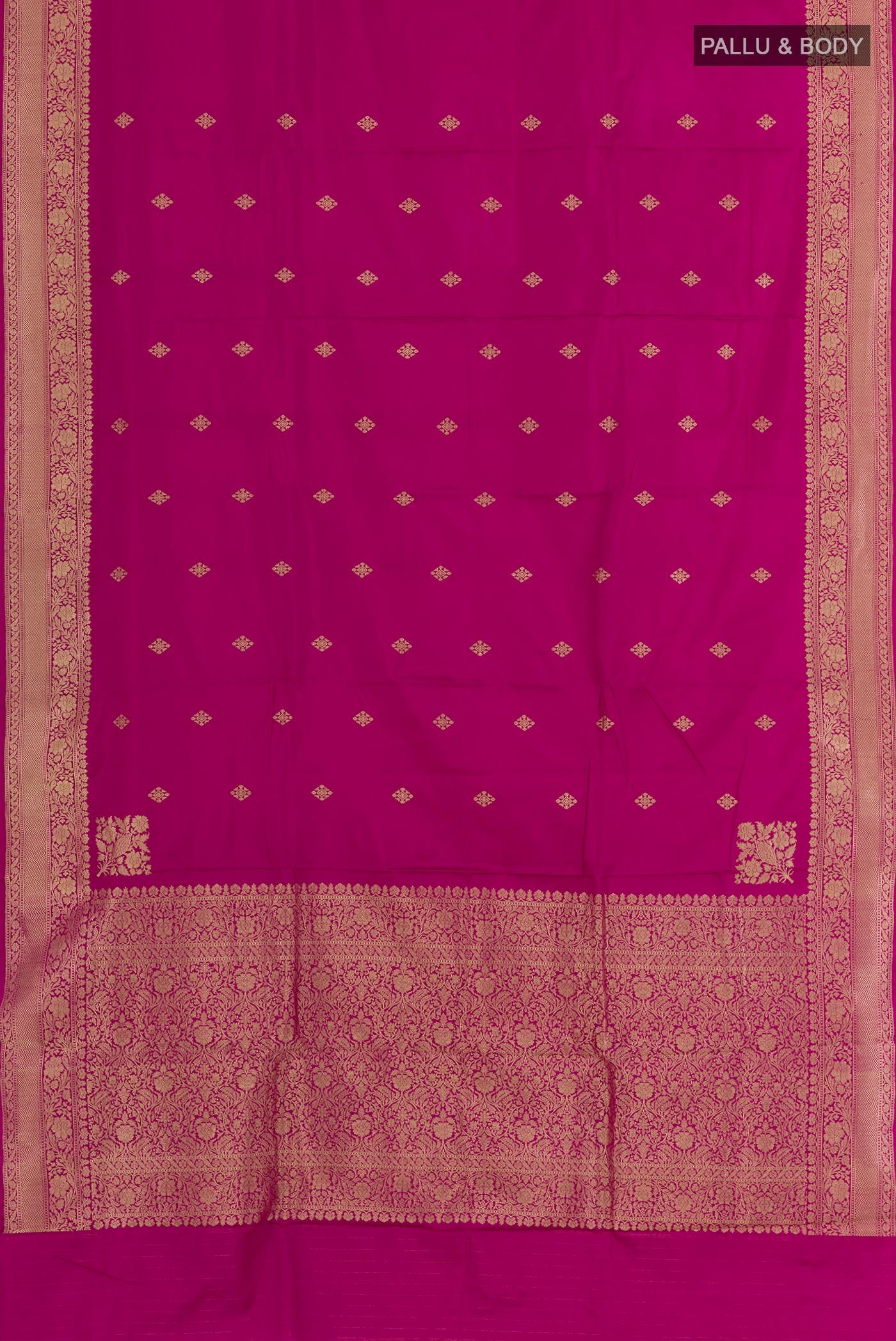 Flat view of Pink Banarasi Silk Saree with Zari Butta on the body and Zari Border. 