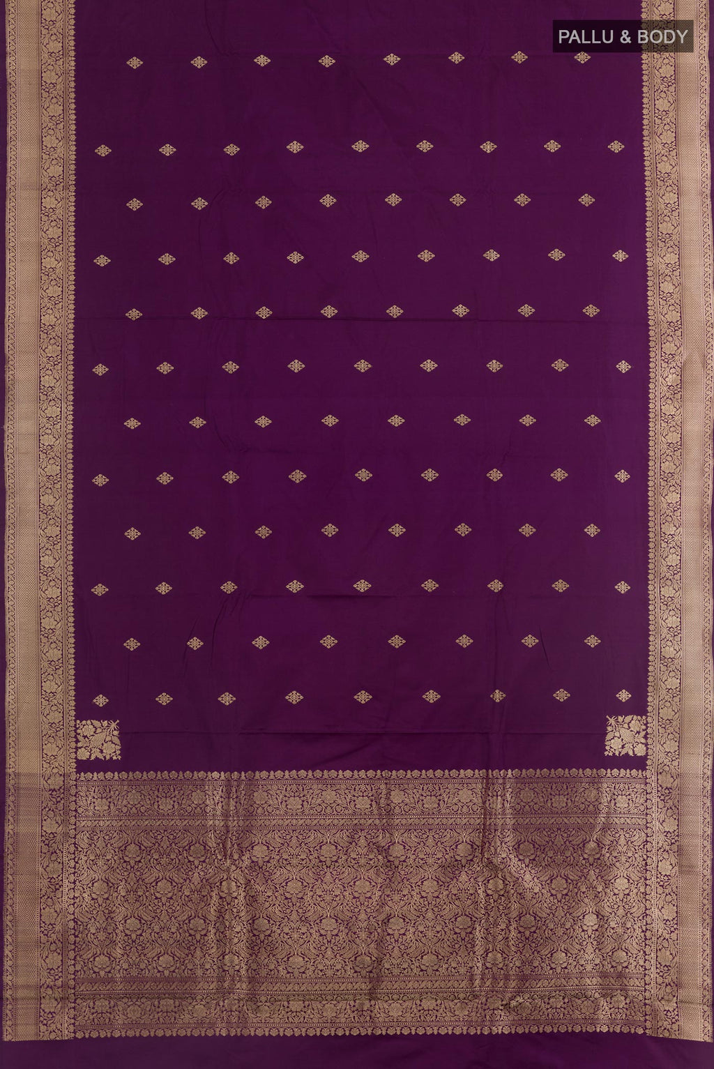 Flat view of Purple Banarasi Silk Saree with Zari Butta on the body and Zari Border. 