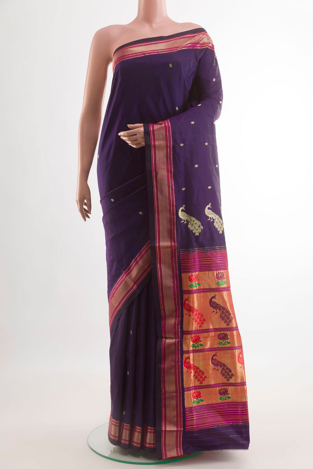 Purple Paithani Silk Saree with Zari Butta on the body and Zari Border.  displayed on a mannequin