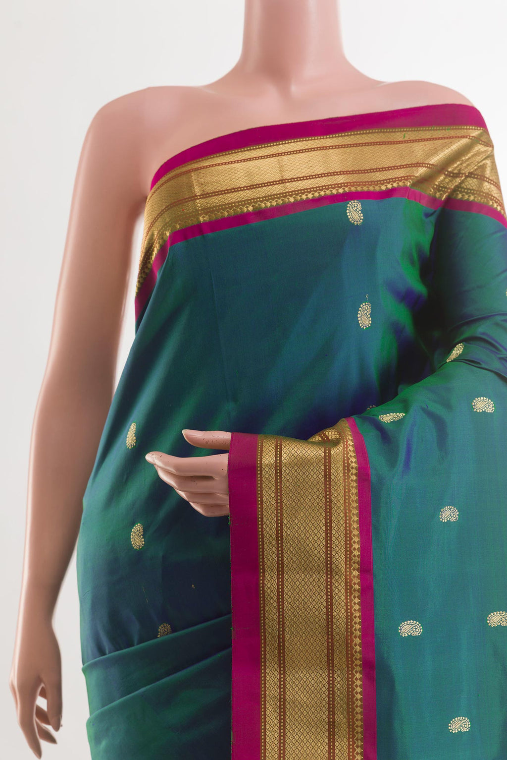 Border image of Peacock Blue Paithani Silk Saree with Zari Butta on the body and Zari Border. 