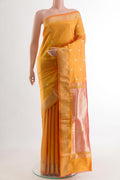 Yellow Paithani Silk Saree with Zari Butta on the body and Zari Border.  displayed on a mannequin