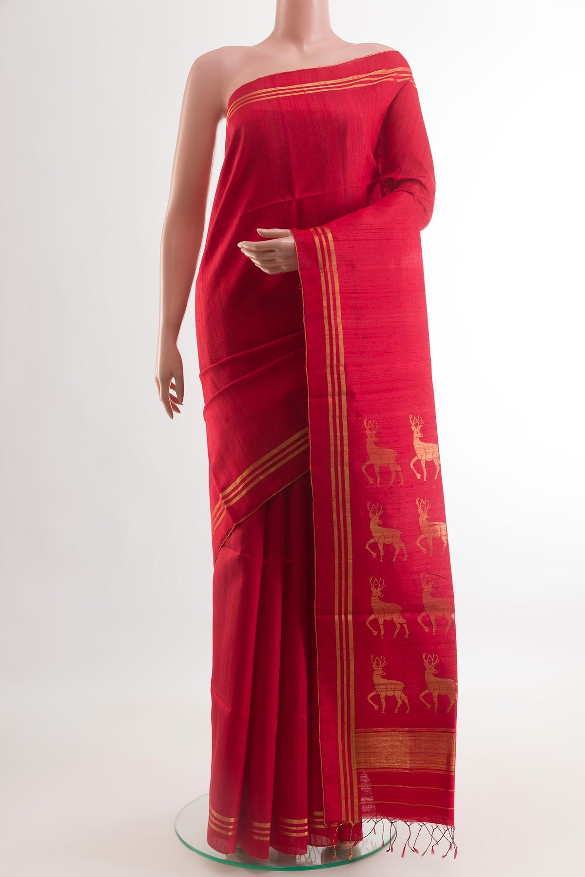Red Raw Silk Saree with Plain Body and Plain Border.  displayed on a mannequin