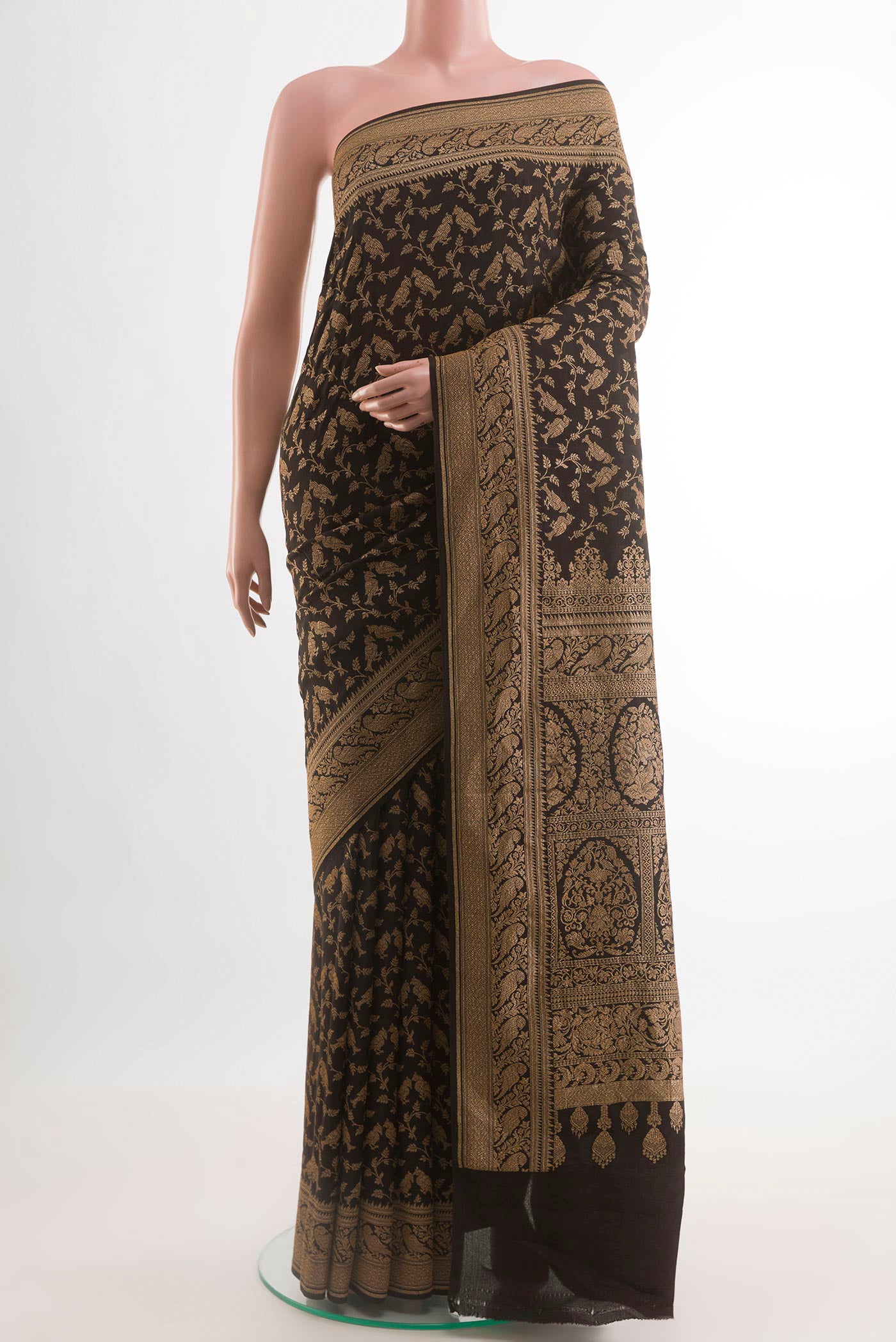 Black Banarasi Georgette Saree with Zari Brocade on the body and Zari Border.  displayed on a mannequin