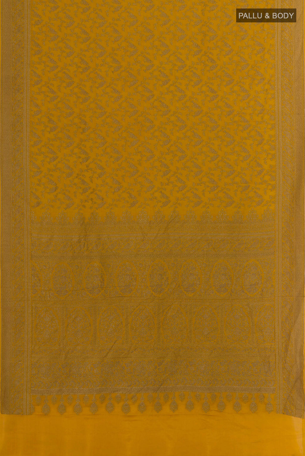 Flat view of Mustard Banarasi Georgette Saree with Zari Brocade on the body and Zari Border. 