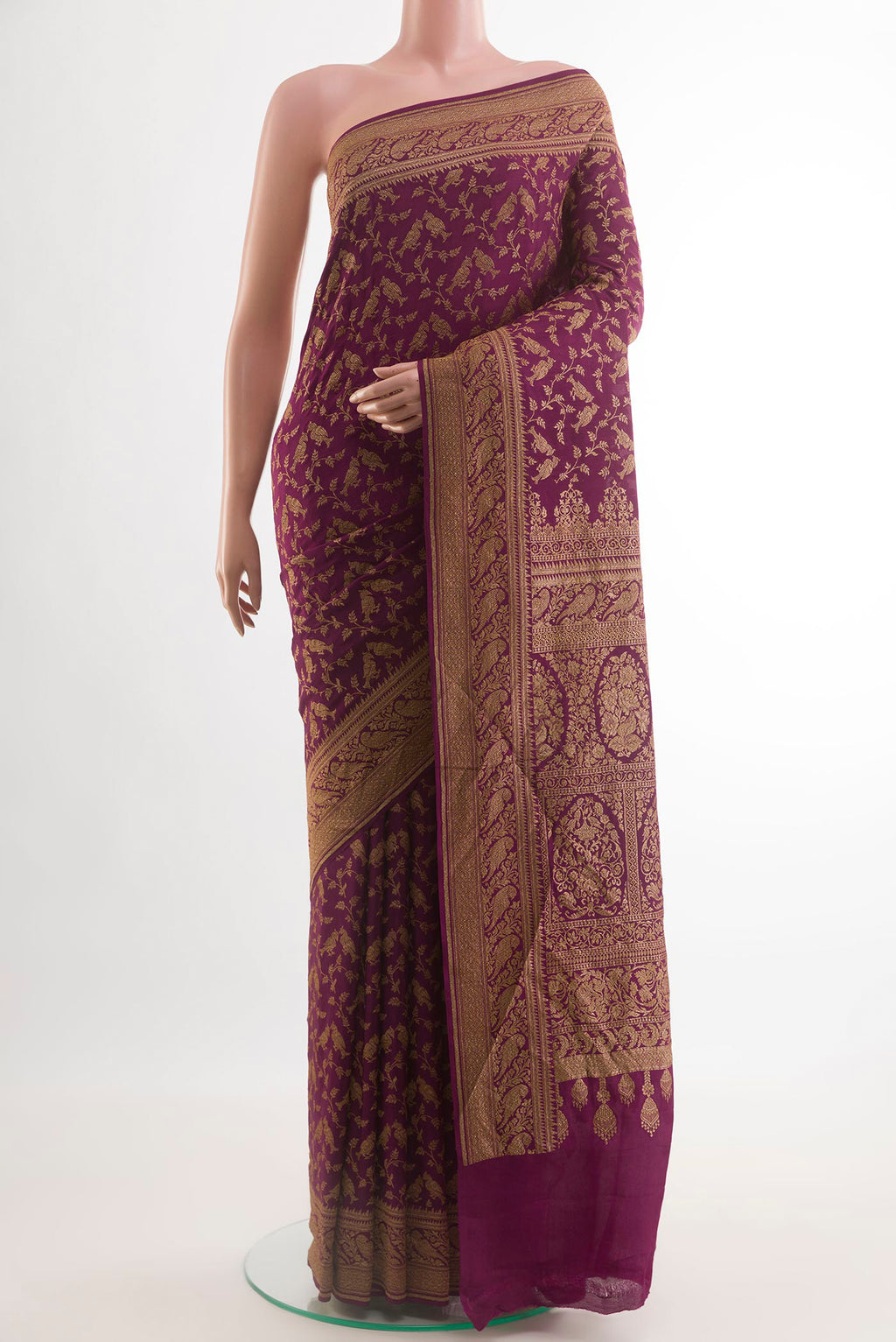 Purple Banarasi Georgette Saree with Zari Brocade on the body and Zari Border.  displayed on a mannequin
