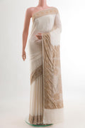 Cream Banarasi Georgette Saree with Plain Body and Zari Border.  displayed on a mannequin