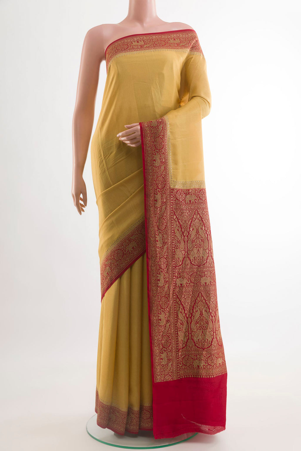 Yellow Banarasi Georgette Saree with Plain Body and Zari Border.  displayed on a mannequin