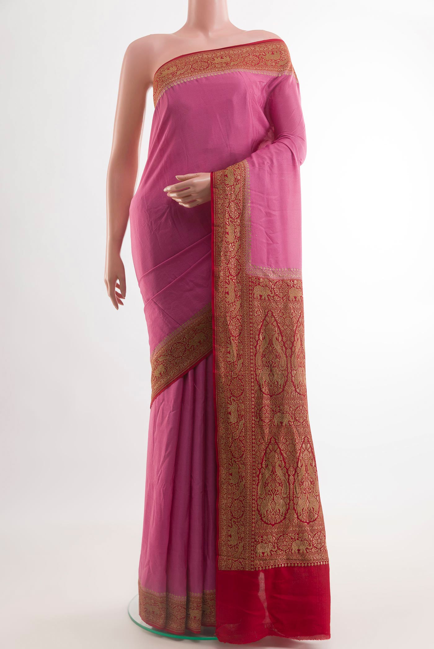 Pink Banarasi Georgette Saree with Plain Body and Zari Border.  displayed on a mannequin