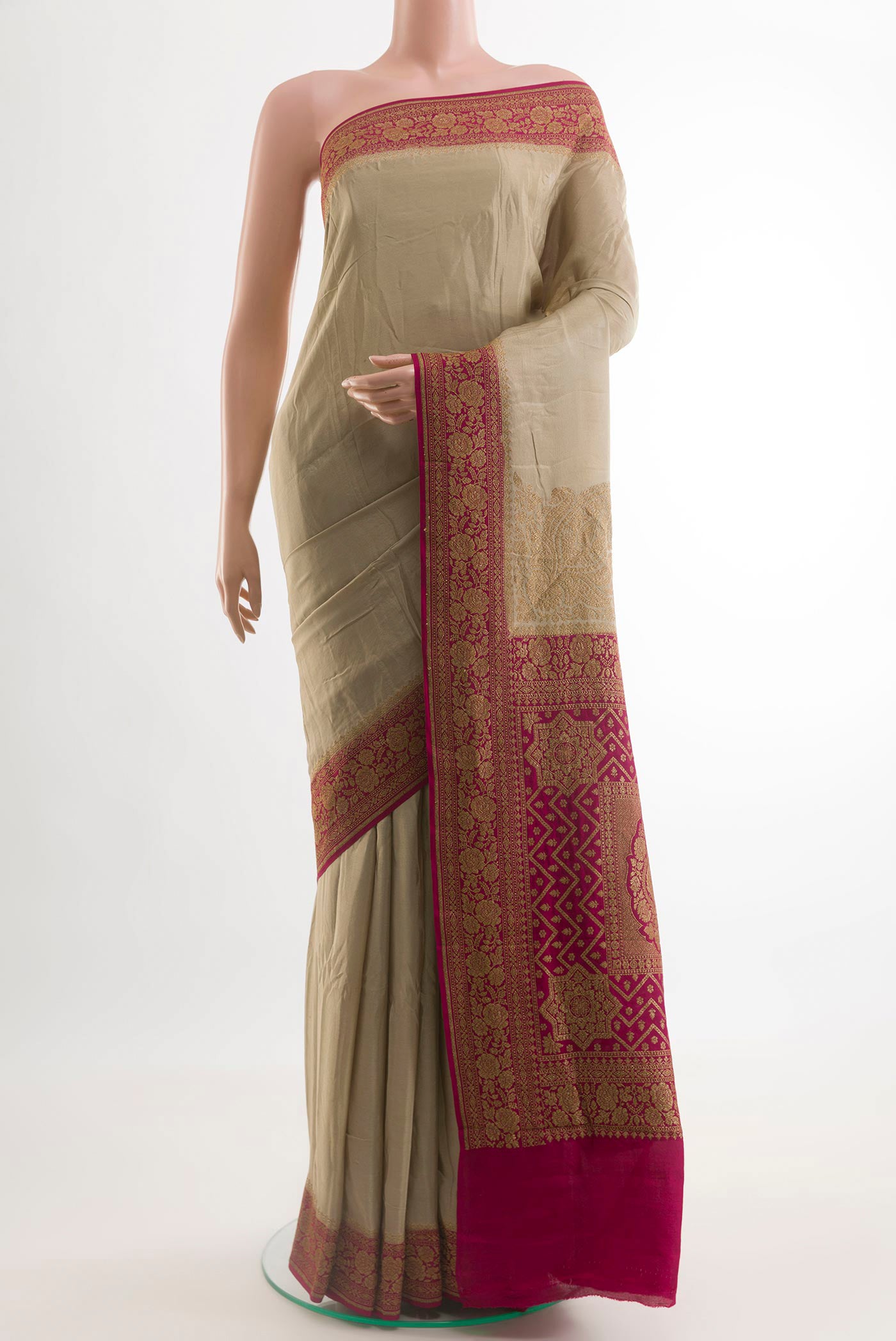Beige Banarasi Georgette Saree with Plain Body and Zari Border.  displayed on a mannequin