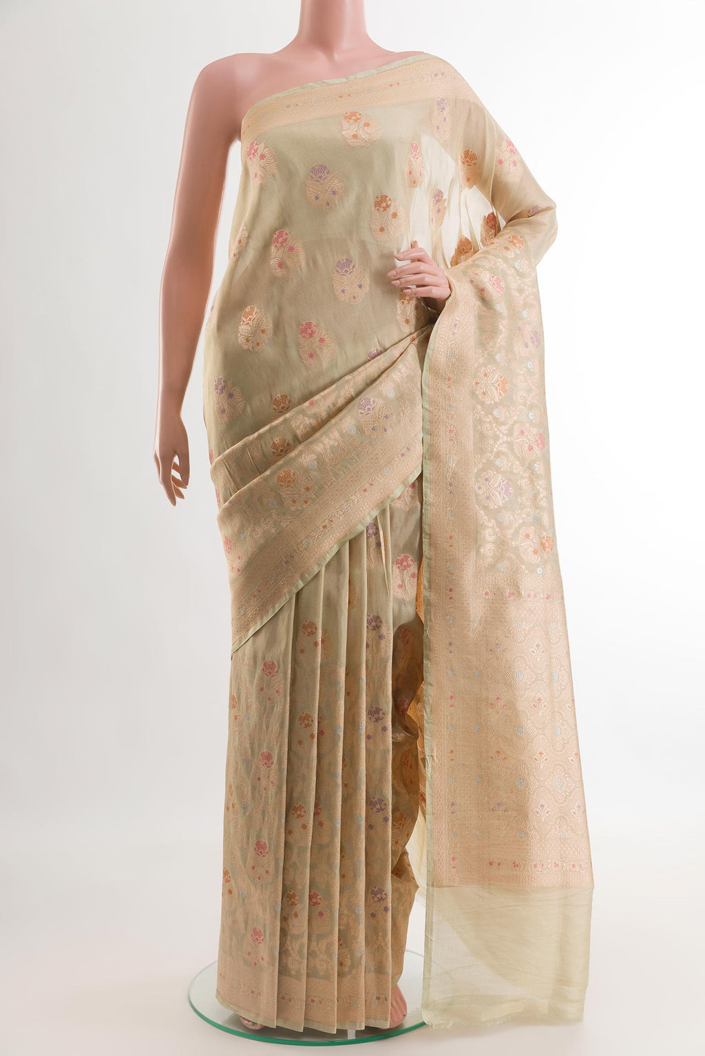 Light Green Banarasi Kora Silk Saree with Zari Brocade on the body and Zari Border.  displayed on a mannequin