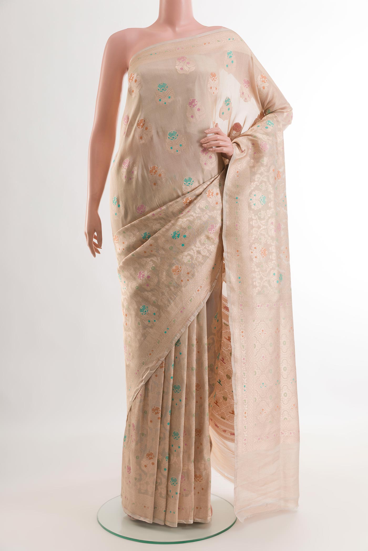 Rose Gold Banarasi Kora Silk Saree with Zari Brocade on the body and Zari Border.  displayed on a mannequin