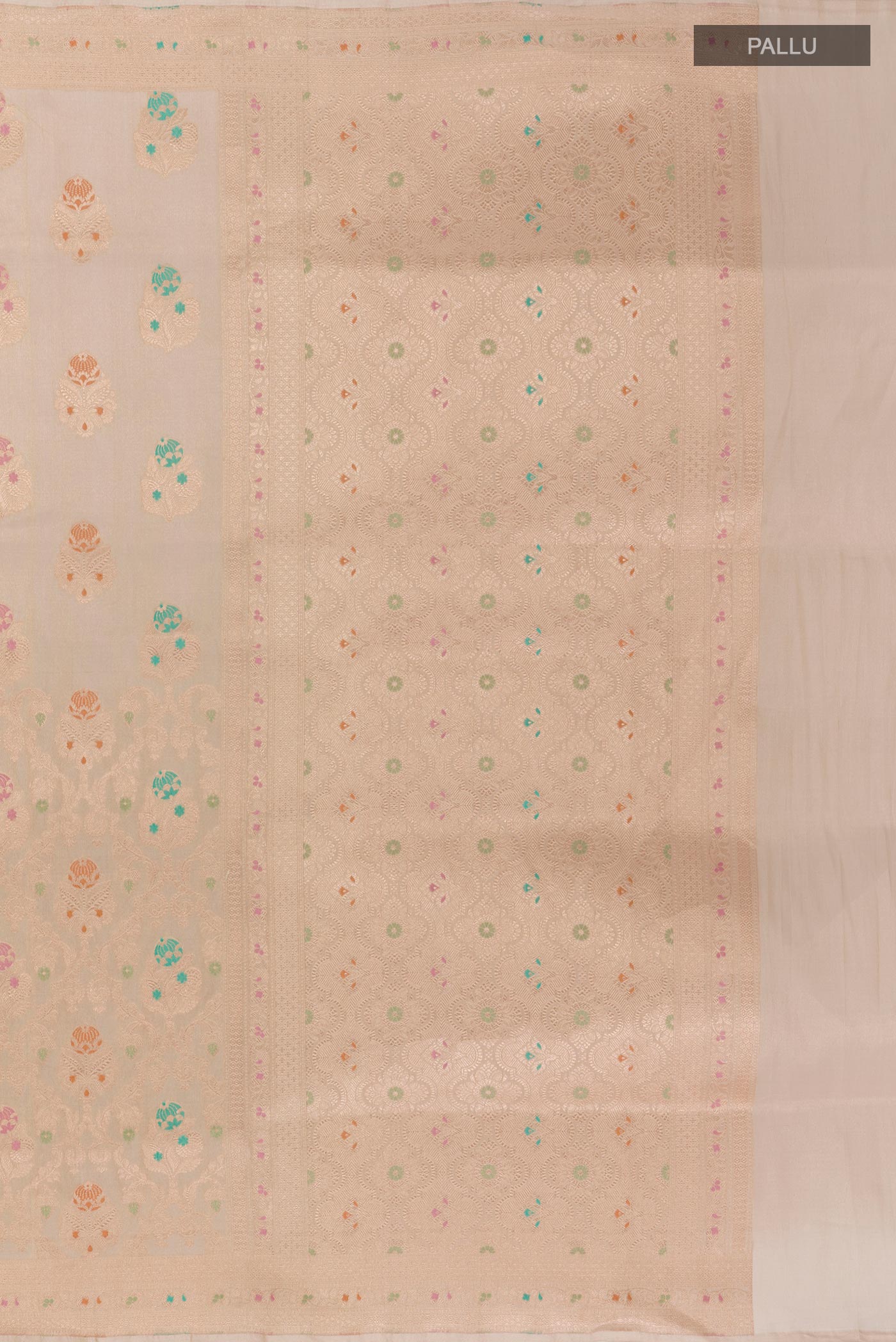 Close up image of the pallu of Rose Gold Banarasi Kora Silk Saree with Zari Brocade on the body and Zari Border. 