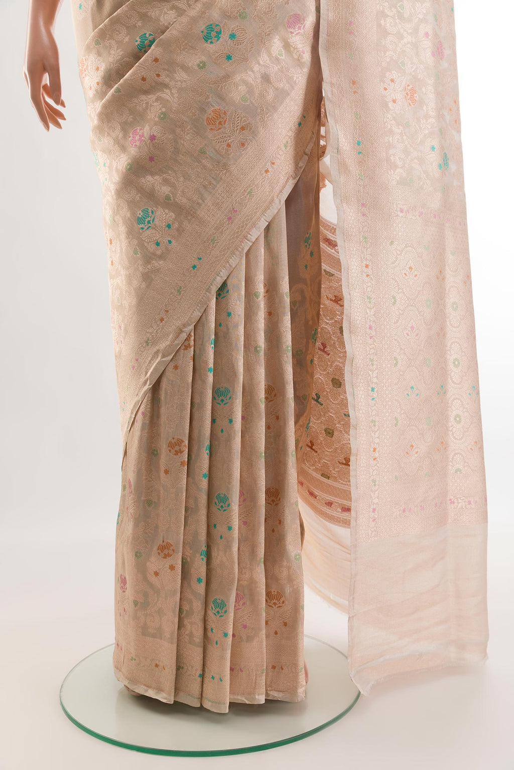 Pleats and pallu of Rose Gold Banarasi Kora Silk Saree with Zari Brocade on the body and Zari Border. 