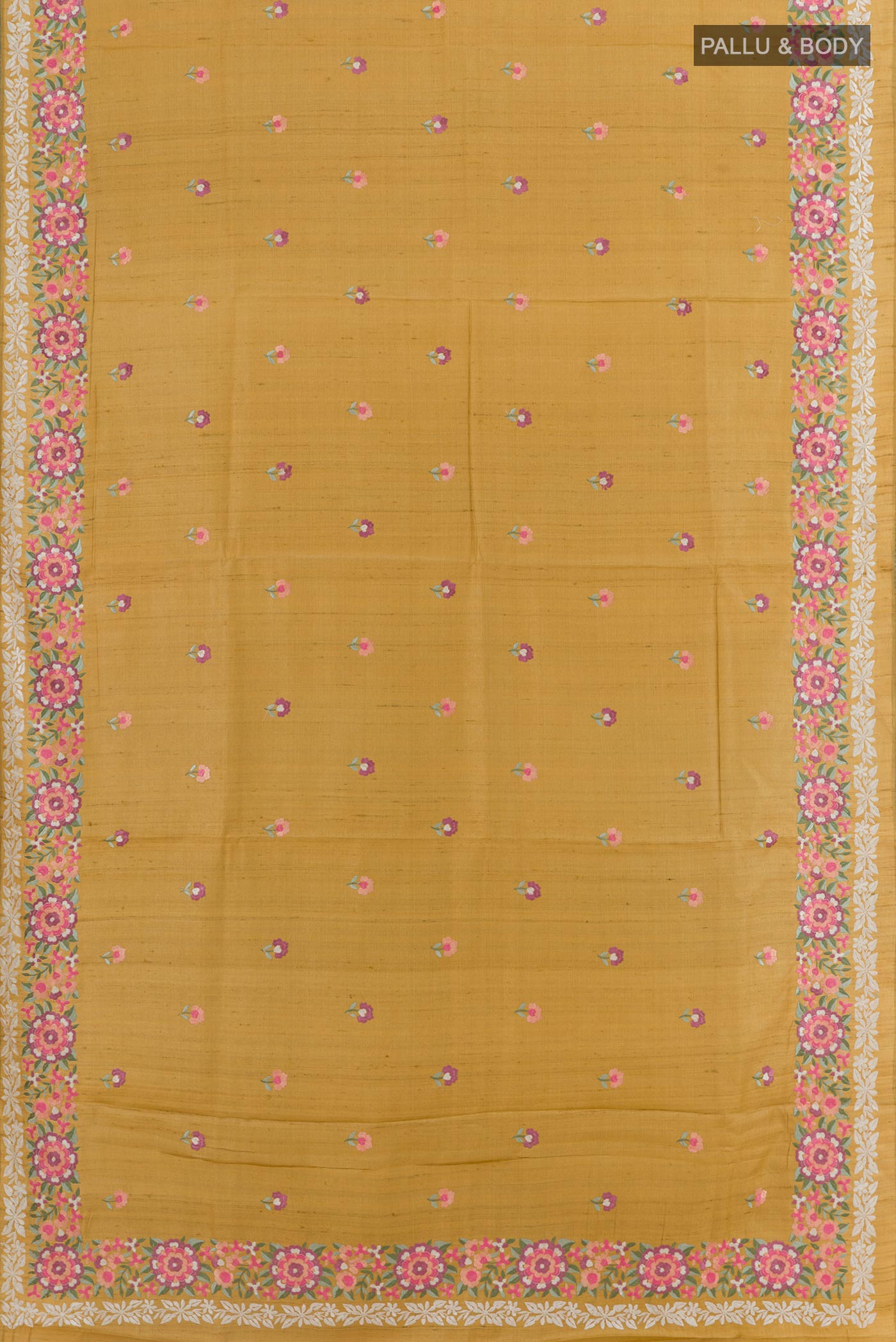 Flat view of Mustard Tussar Silk Saree with Embroidery on the body and Embroidery Border. 
