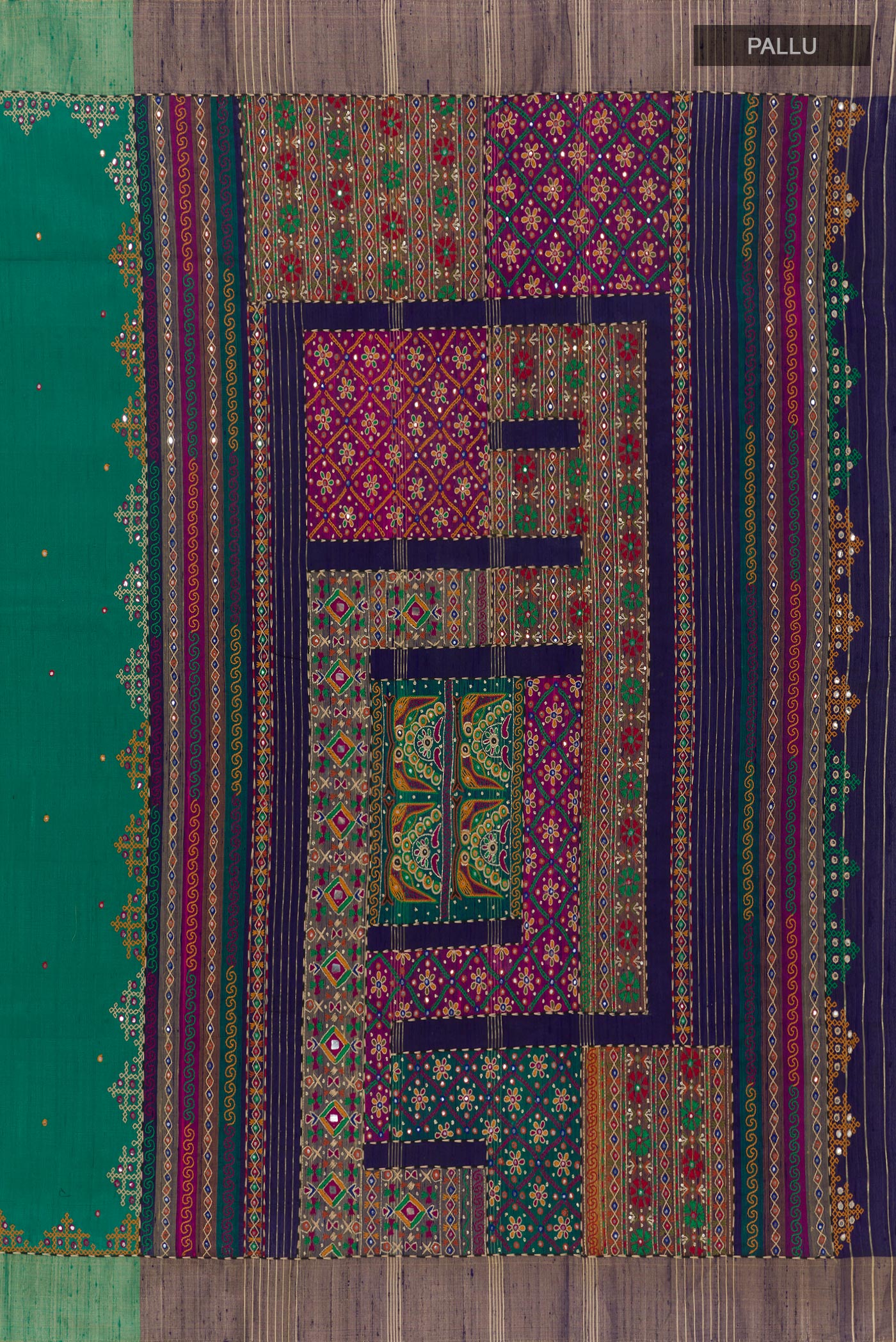 Close up image of the pallu of Green Tussar Silk Saree with Embroidery on the body and Embroidery Border. 