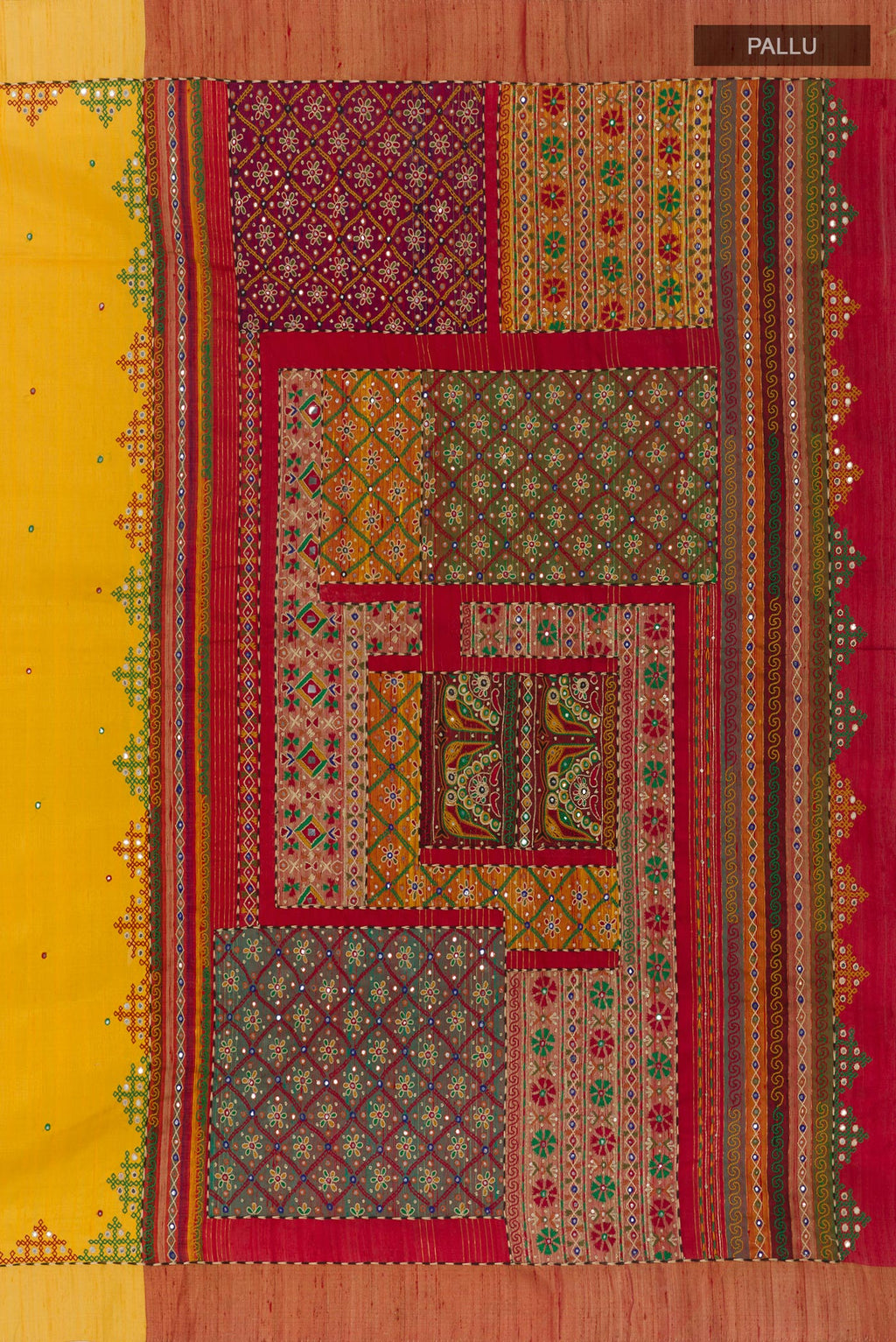 Close up image of the pallu of Yellow Tussar Silk Saree with Embroidery on the body and Embroidery Border. 