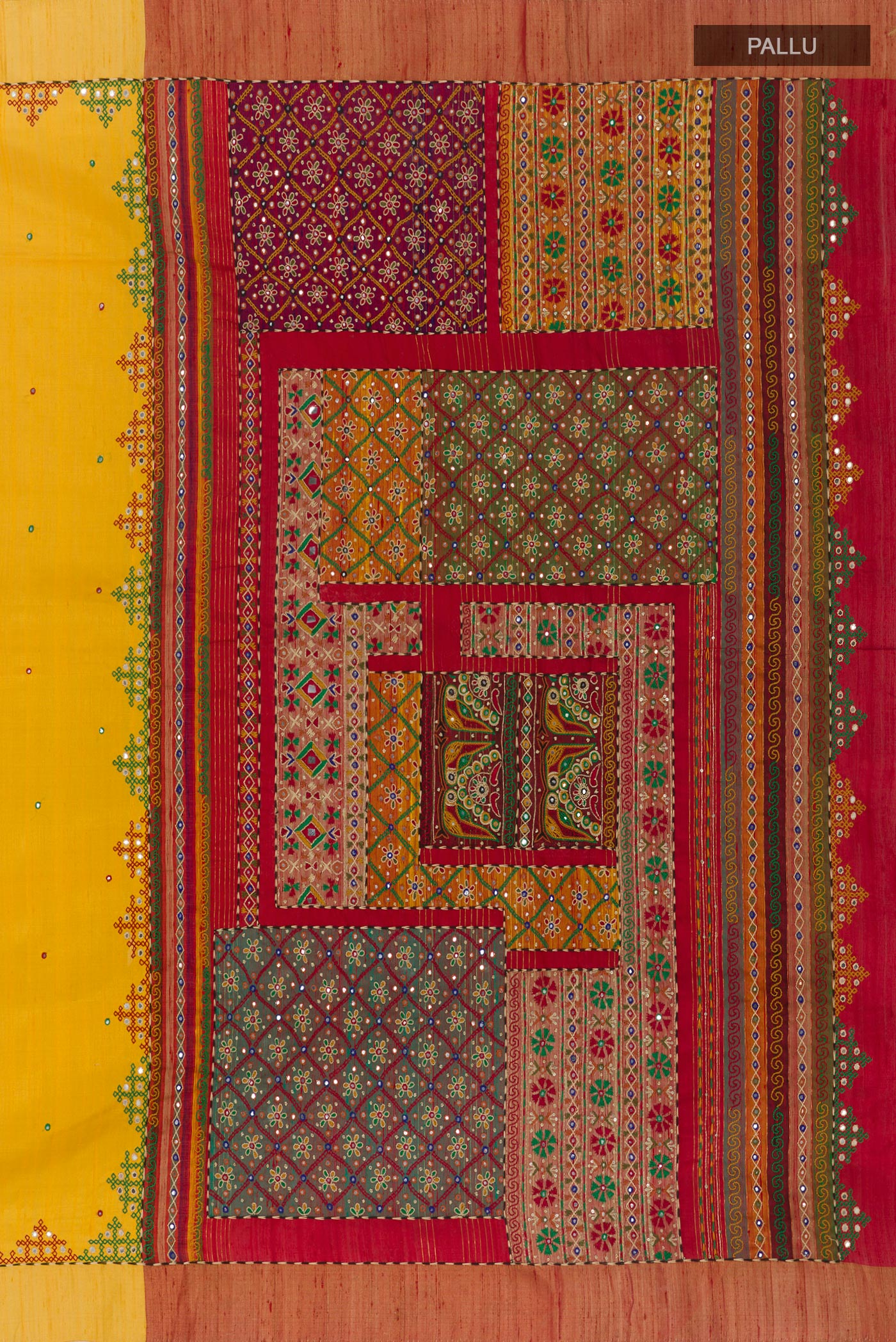 Close up image of the pallu of Yellow Tussar Silk Saree with Embroidery on the body and Embroidery Border. 