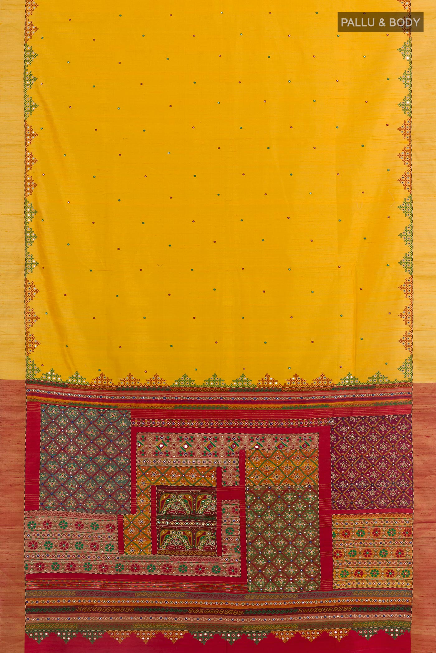 Flat view of Yellow Tussar Silk Saree with Embroidery on the body and Embroidery Border. 