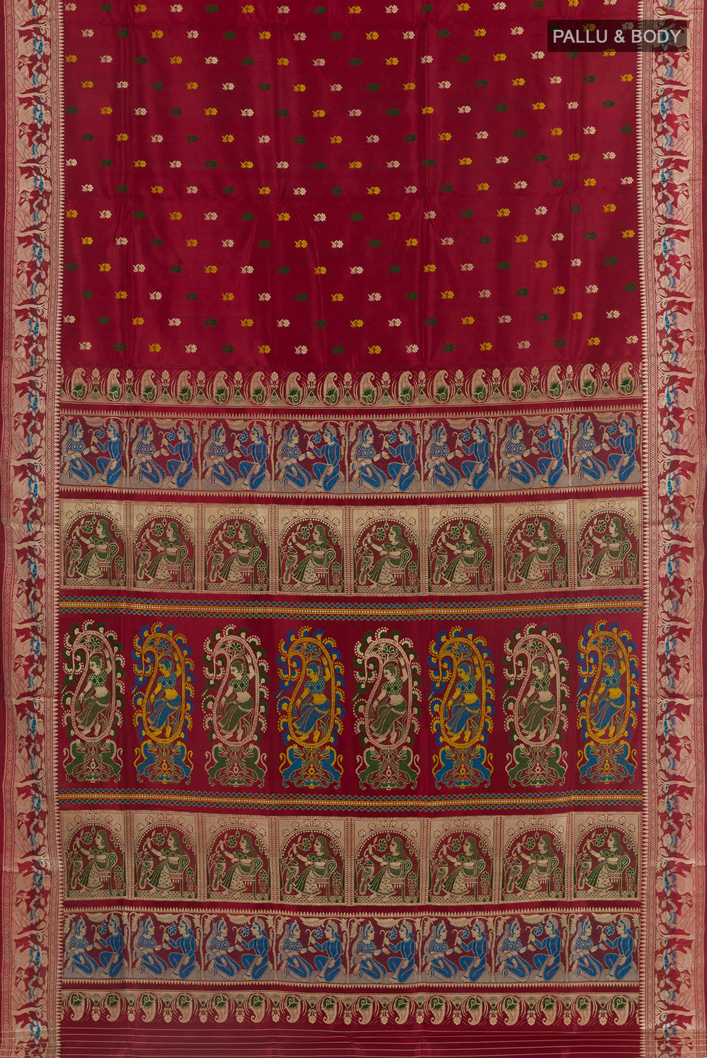 Flat view of Maroon Baluchari Silk Saree with Zari And Thread Butta on the body and Zari Border. 