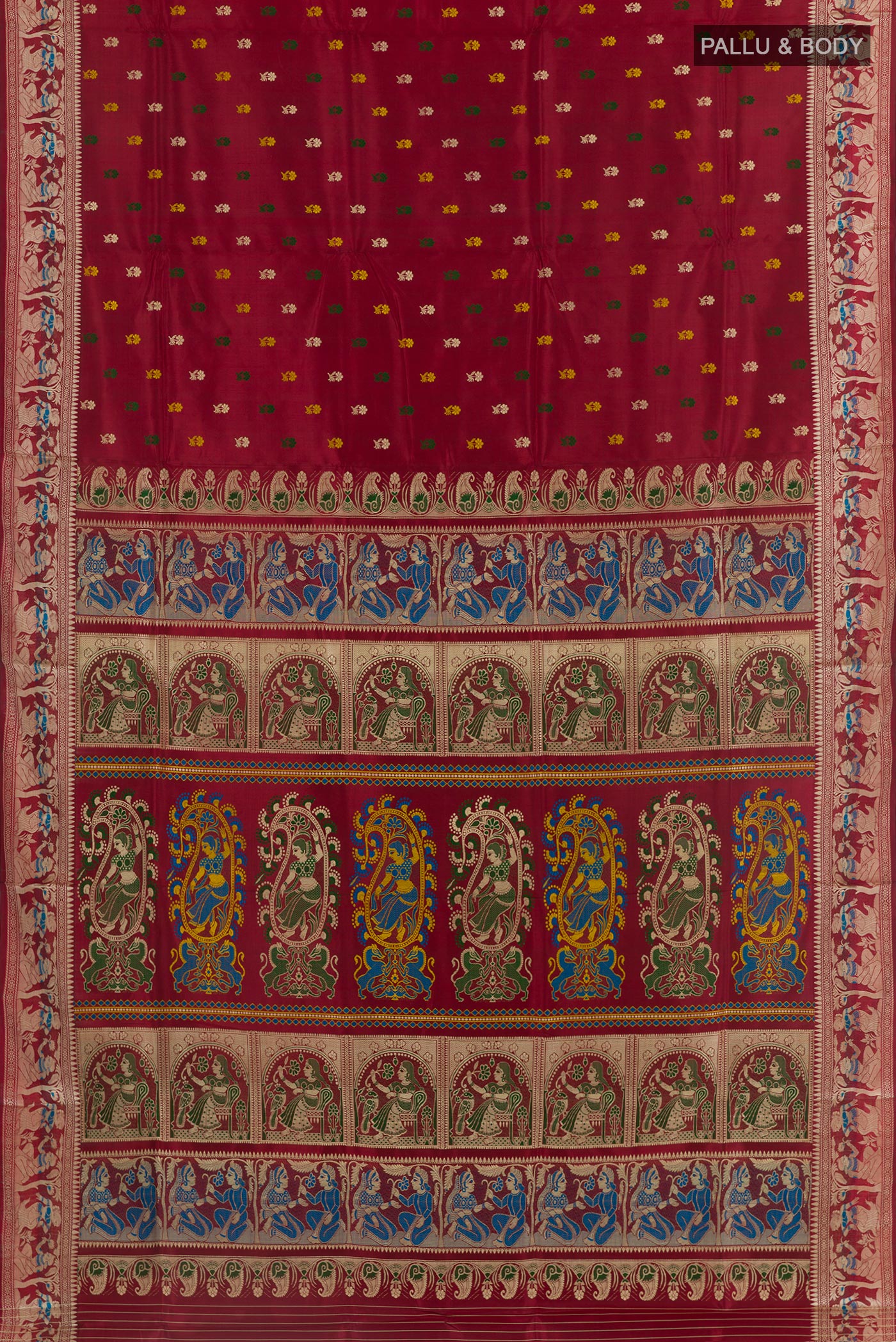 Flat view of Maroon Baluchari Silk Saree with Zari And Thread Butta on the body and Zari Border. 