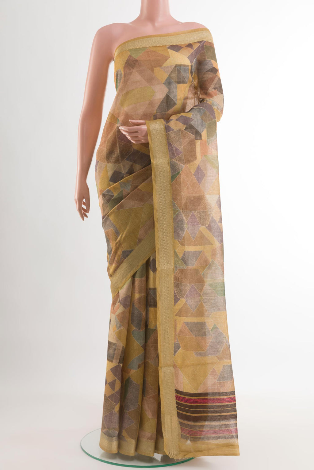 Multi Color Tussar Silk Saree with Geometric Print on the body and Zari Border.  displayed on a mannequin
