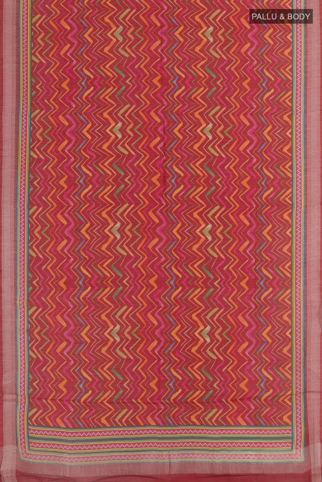 Flat view of Red Tussar Saree with Printed design on the body and Zari Border. 