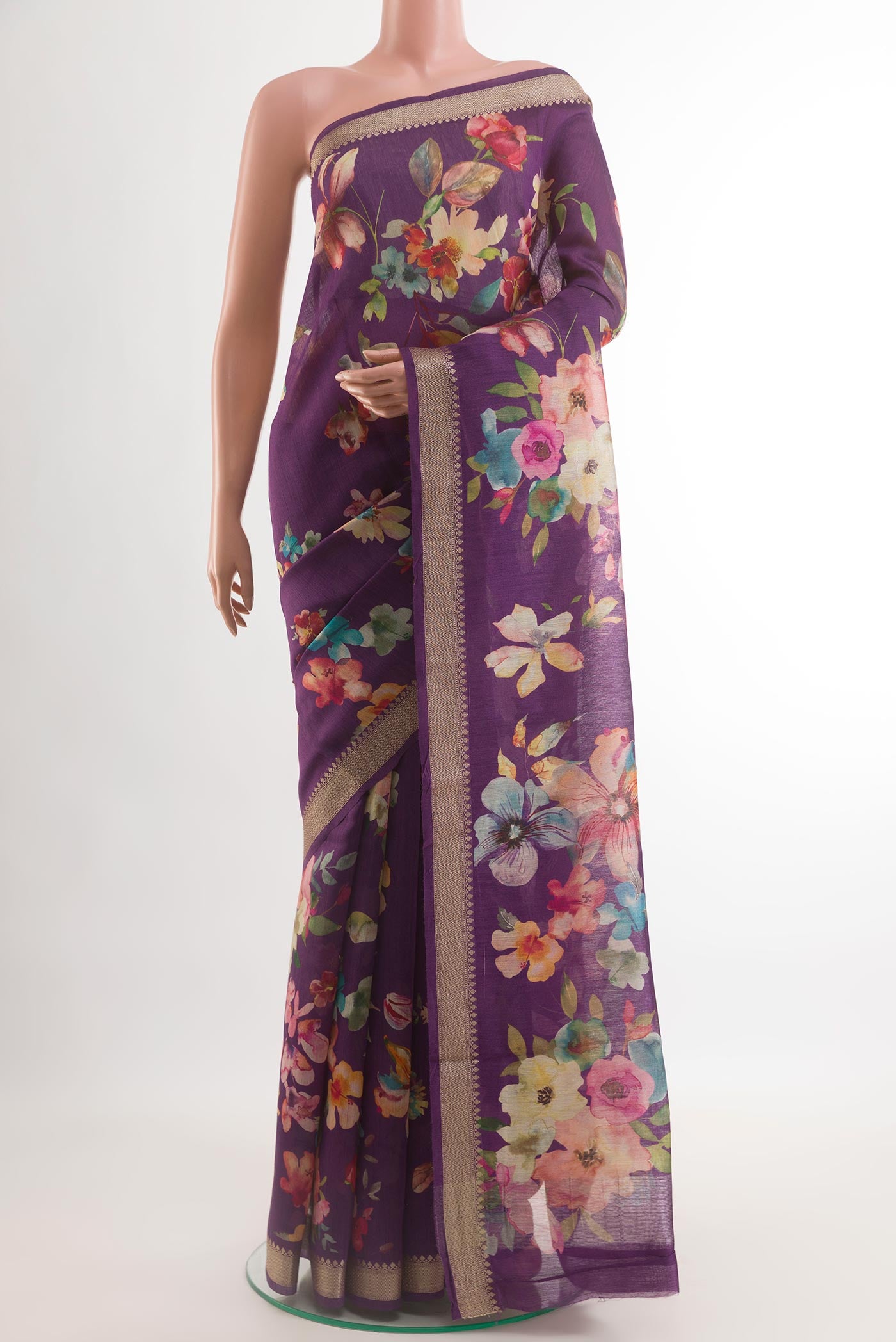 Violet Tussar Silk Saree with Floral Print on the body and Zari Border.  displayed on a mannequin