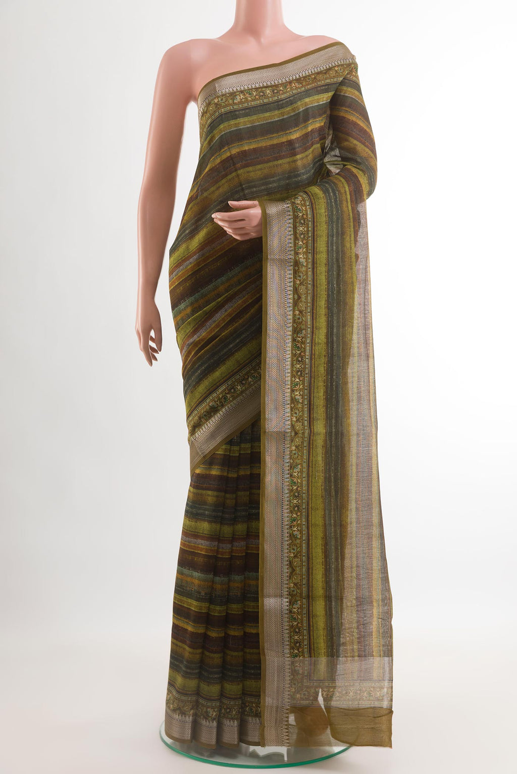 Multi Color Tussar Silk Saree with Printed design on the body and Zari Border.  displayed on a mannequin