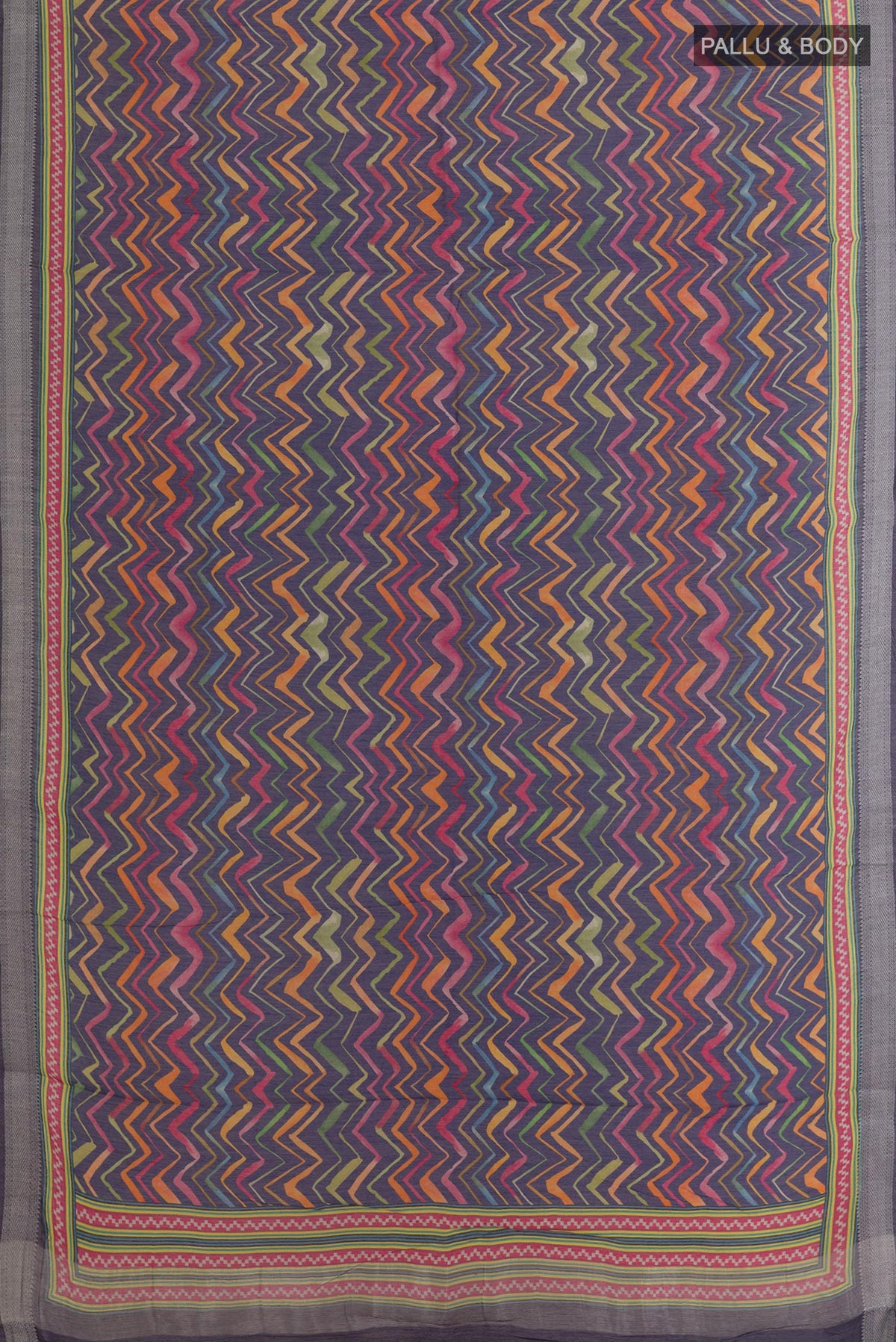 Flat view of Blue Tussar Silk Saree with Printed design on the body and Zari Border. 